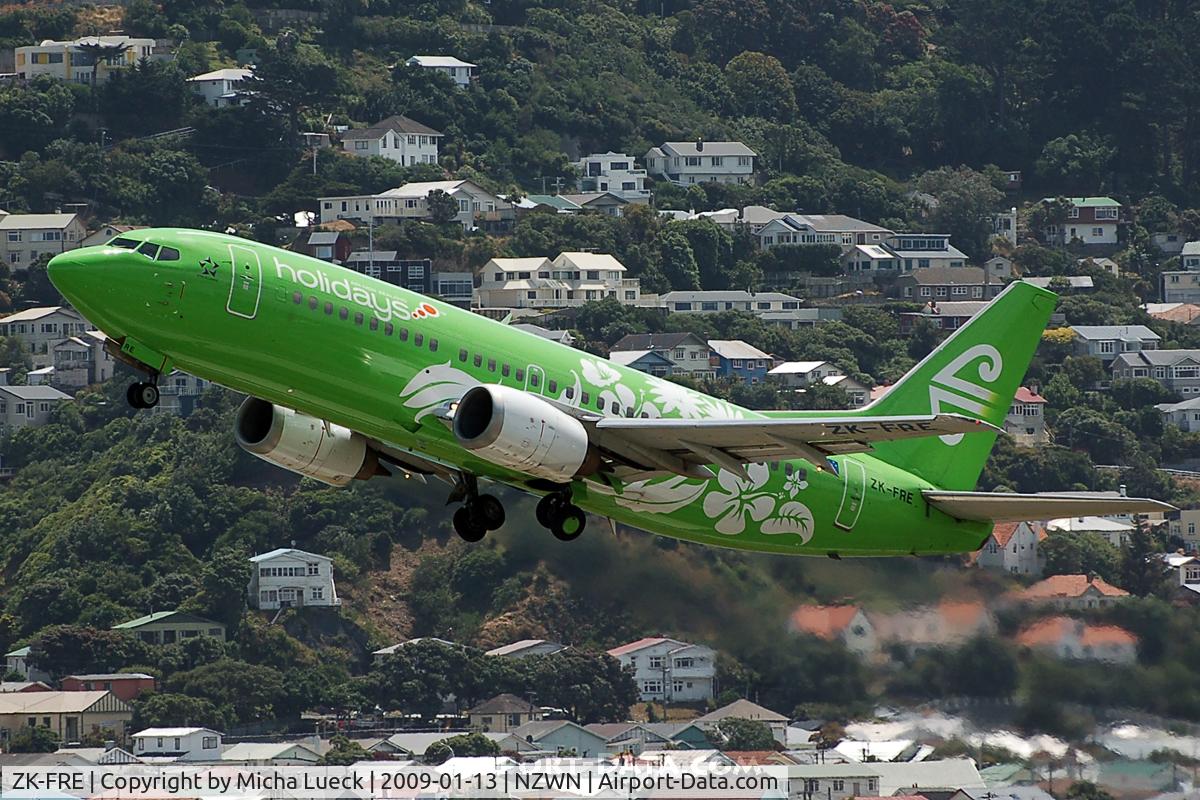 ZK-FRE, 1998 Boeing 737-3U3 C/N 28742, Climbing out of Wellington