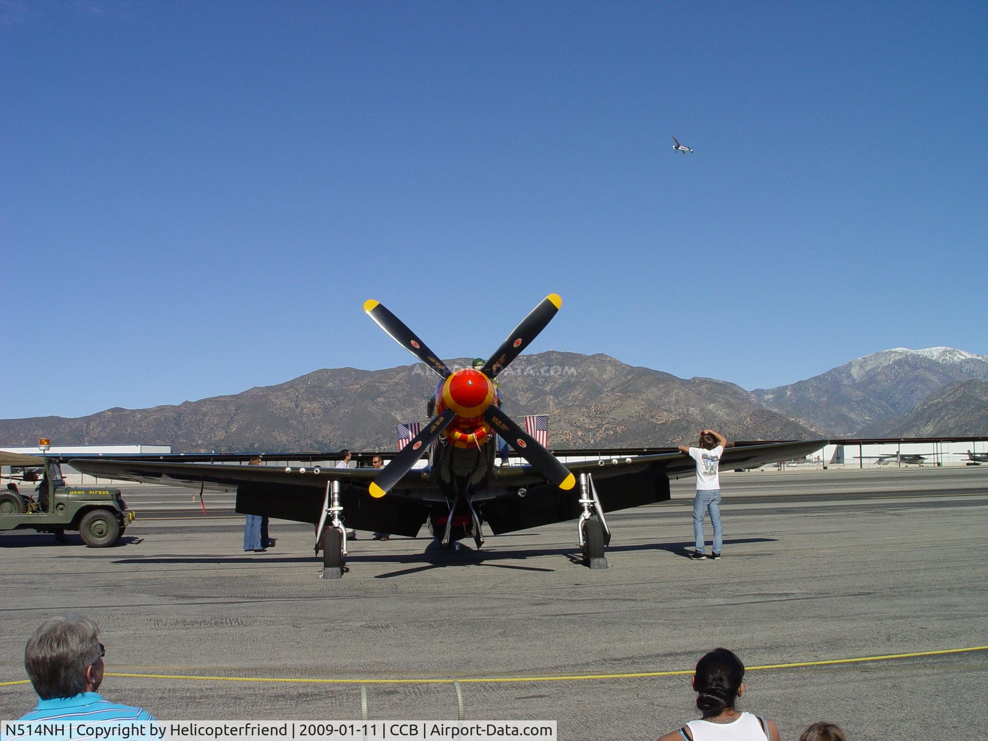 N514NH, 1944 North American P-51D Mustang C/N 122-44706  (44-84850), Sitting with pride, while RC planes fly in background