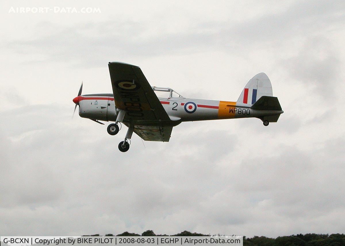 G-BCXN, 1952 De Havilland DHC-1 Chipmunk T.10 C/N C1/0692, CHIPPY OWNED BY AVIATION ARTIST MICHAEL TURNER DEPARTING THE MICROLIGHT TRADE FAIR