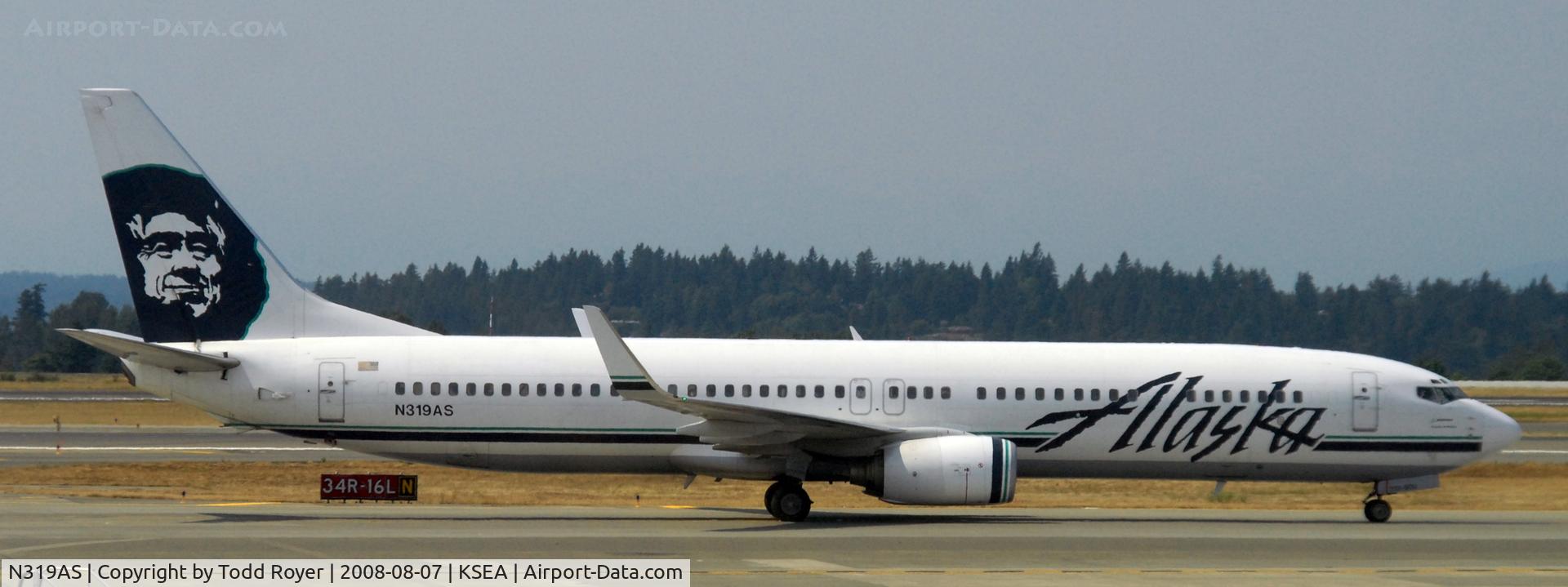 N319AS, 2003 Boeing 737-990 C/N 33679, Taxi to gate