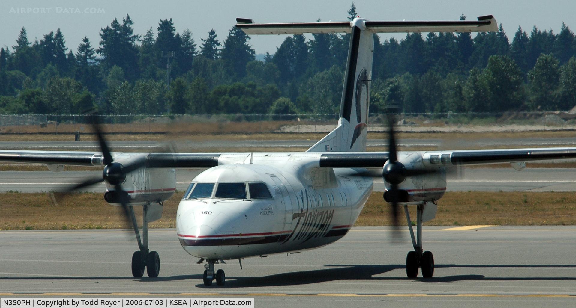 N350PH, 1997 De Havilland Canada DHC-8-202 Dash 8 C/N 488, Taxi to gate