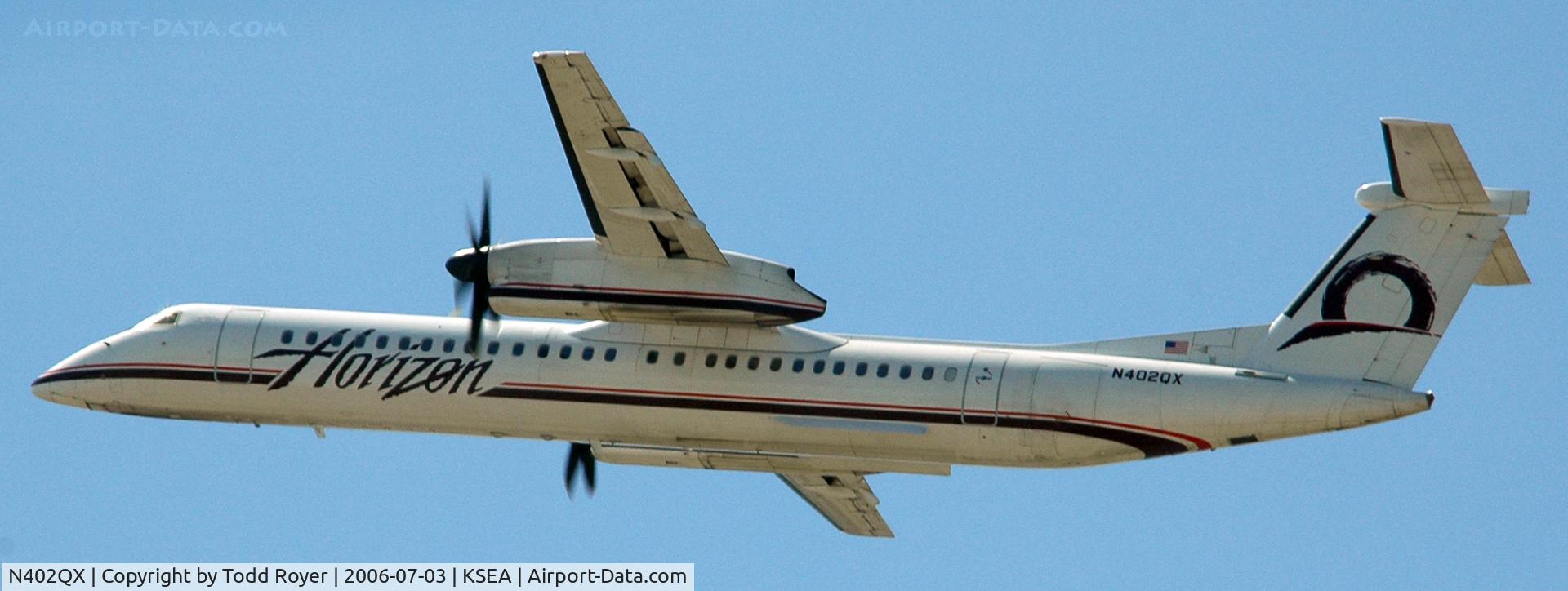 N402QX, 2001 Bombardier DHC-8-402 Dash 8 C/N 4032, Departing SEA on 16L