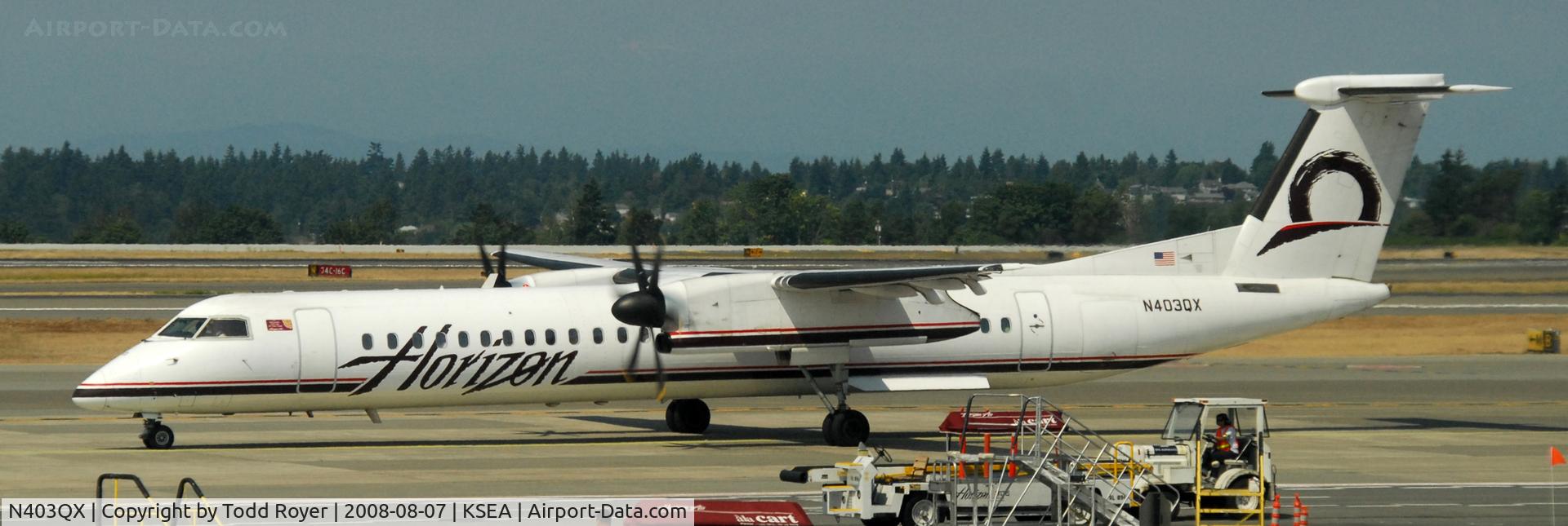 N403QX, 2001 De Havilland Canada DHC-8-402 Dash 8 C/N 4037, Taxi to gate