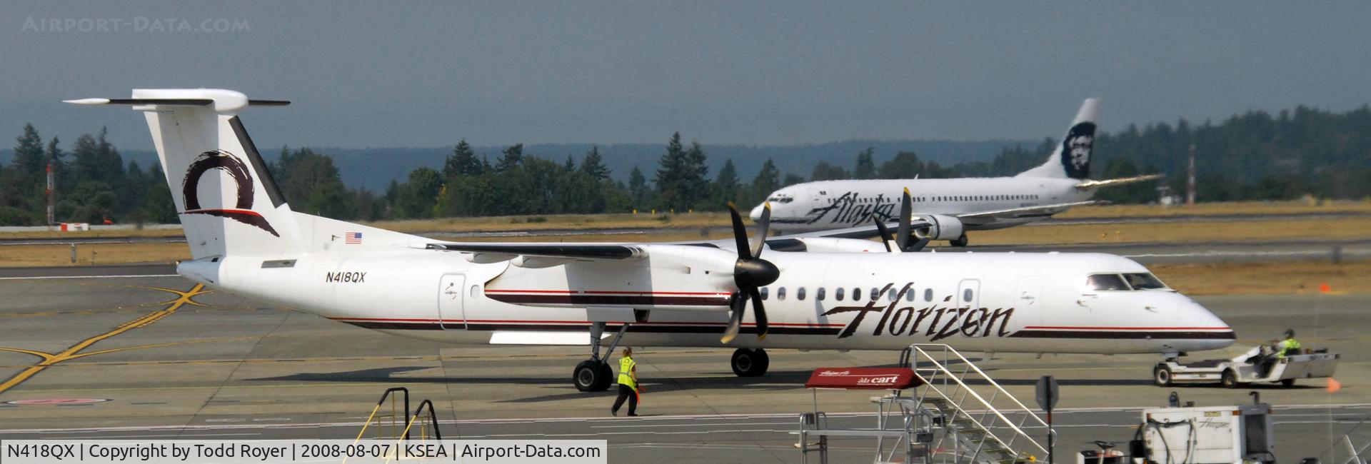 N418QX, 2007 Bombardier DHC-8-402 Dash 8 C/N 4143, Push back for departure