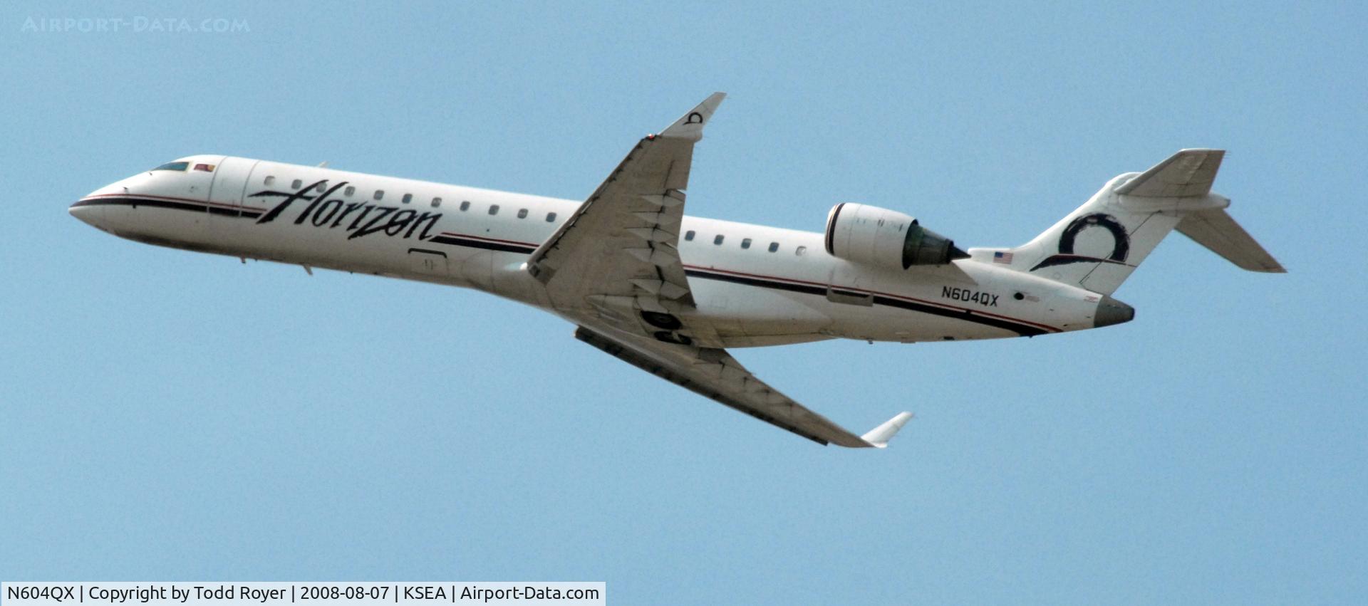 N604QX, 2001 Bombardier CRJ-701 (CL-600-2C10) C/N 10019, Departing SEA on 16L