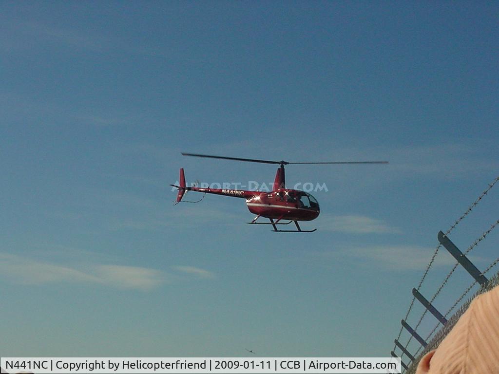 N441NC, 2005 Robinson R44 II C/N 10621, Over the fence to landing pad at southside of Cable