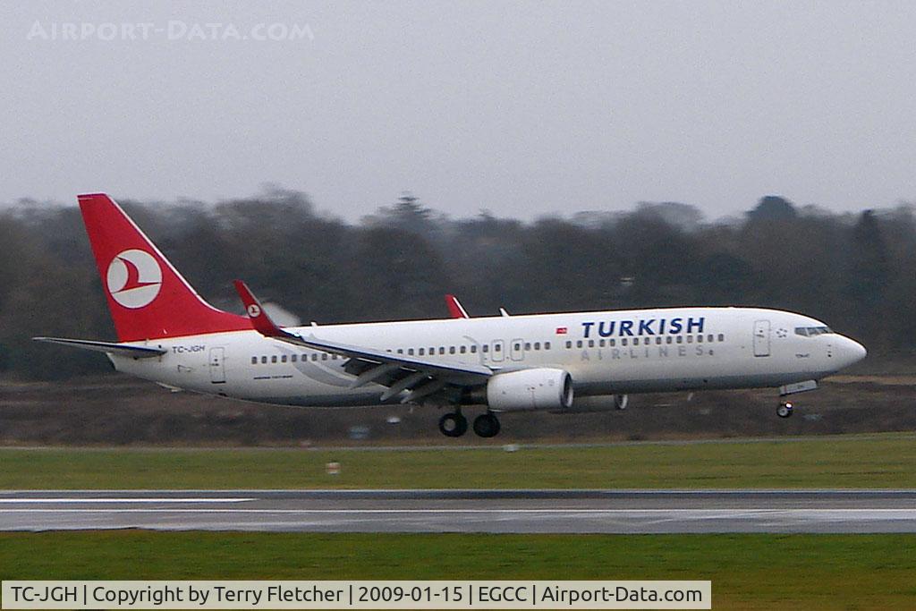 TC-JGH, 2006 Boeing 737-8F2 C/N 34406, THY Boeing 737-400 touches down on a typically gloomy Manchester day