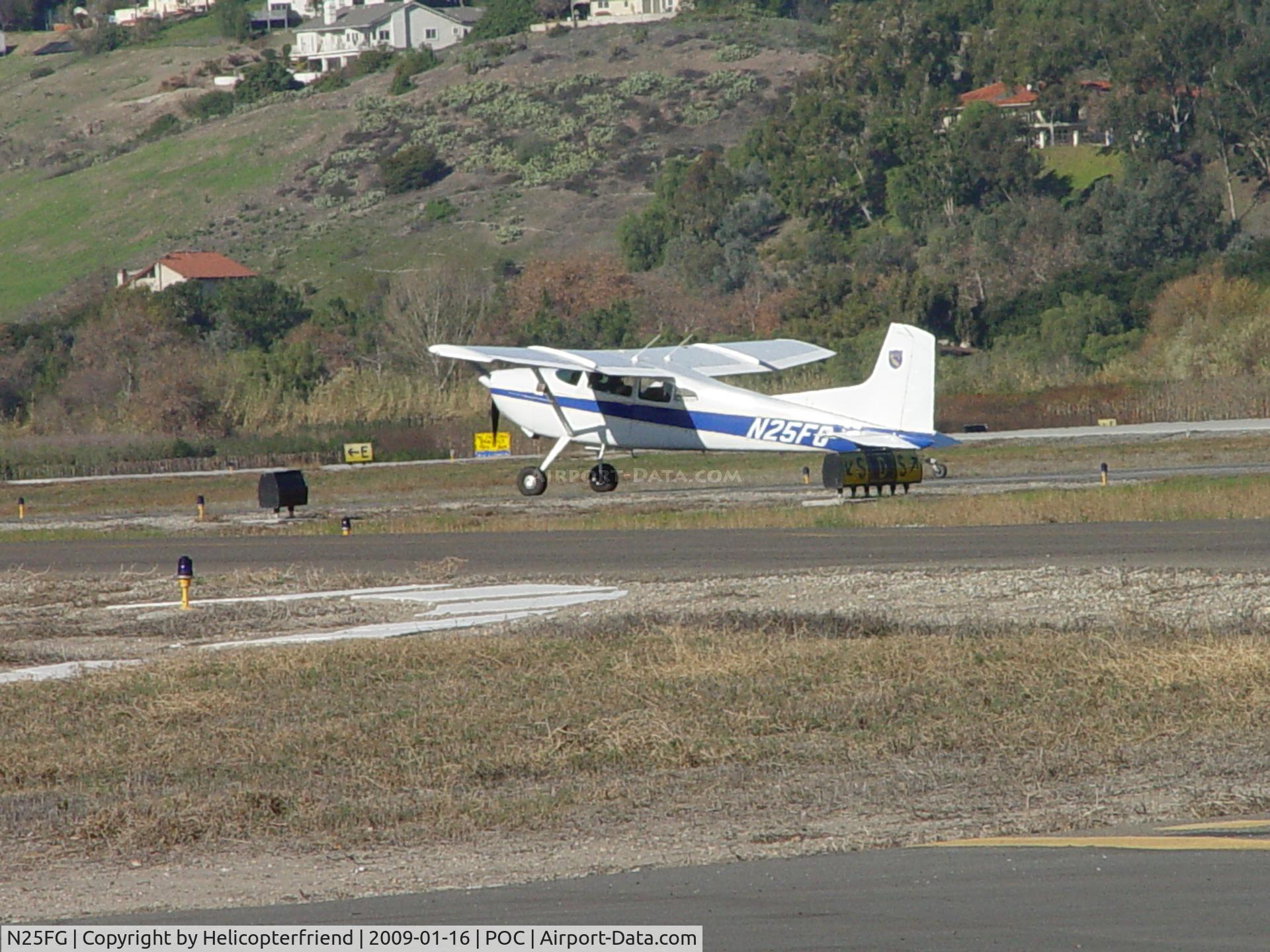 N25FG, 1974 Cessna A185F Skywagon 185 C/N 18502425, Waiting for N79MS tp pass on taxiway