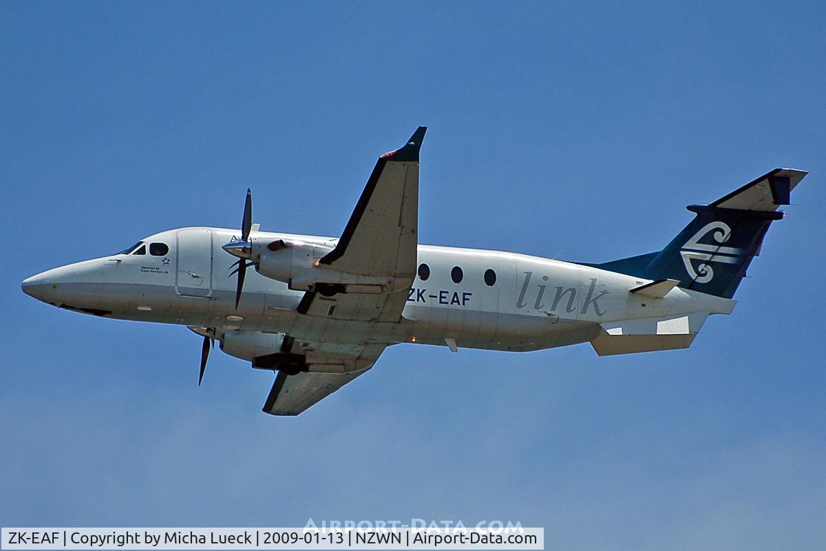 ZK-EAF, 2001 Raytheon 1900D C/N UE-429, Climbing out of Wellington