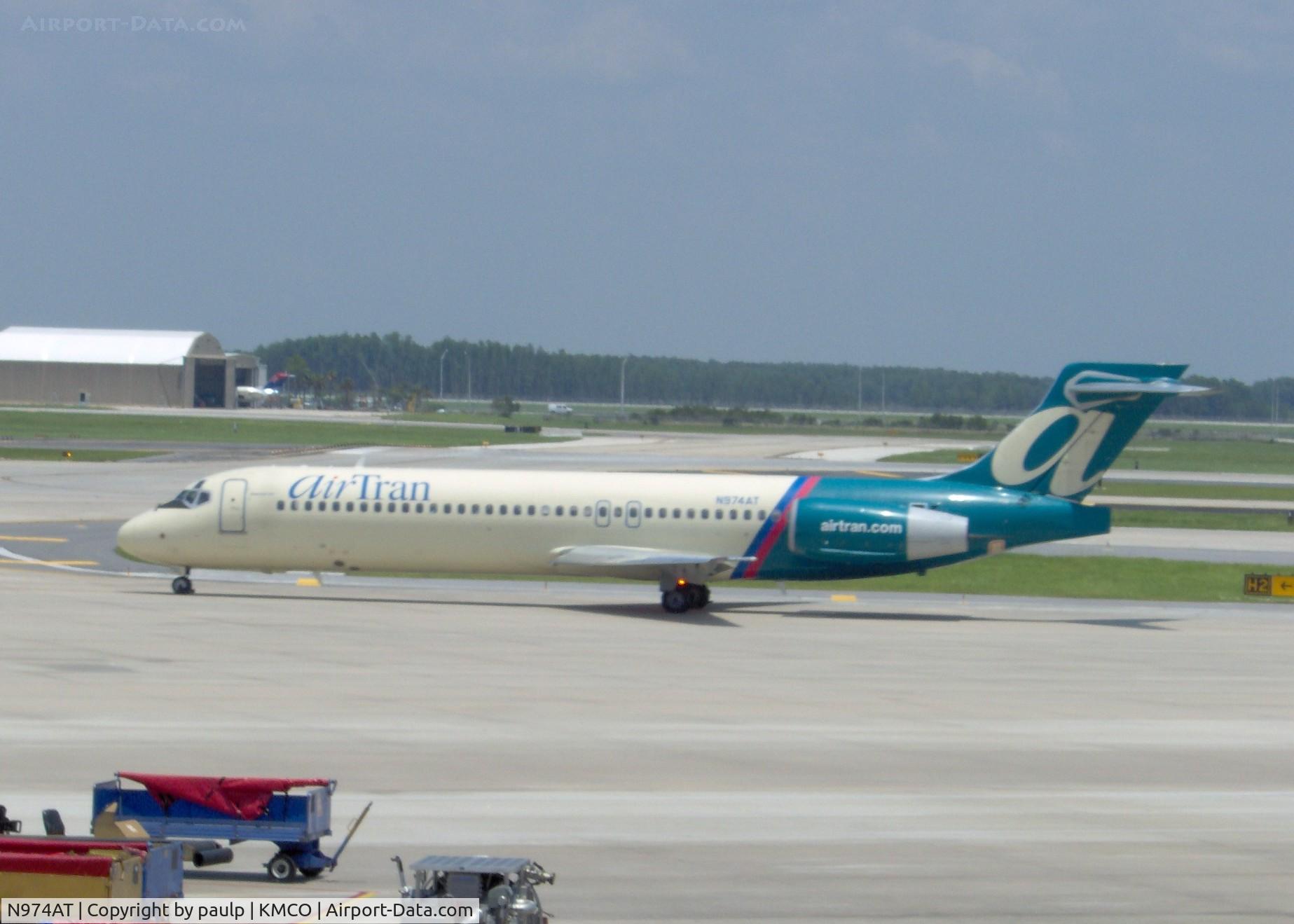 N974AT, 2002 Boeing 717-200 C/N 55034, AirTran 717 taxiing from the gate at Orlando.