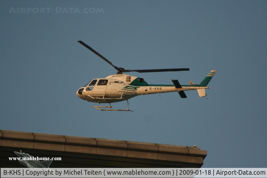 B-KHS, Aerospatiale AS-355N Ecureuil 2 C/N 5718, Heliservices (Hong Kong) taking off from Peninsula Hotel for a tour over Victoria Harbour