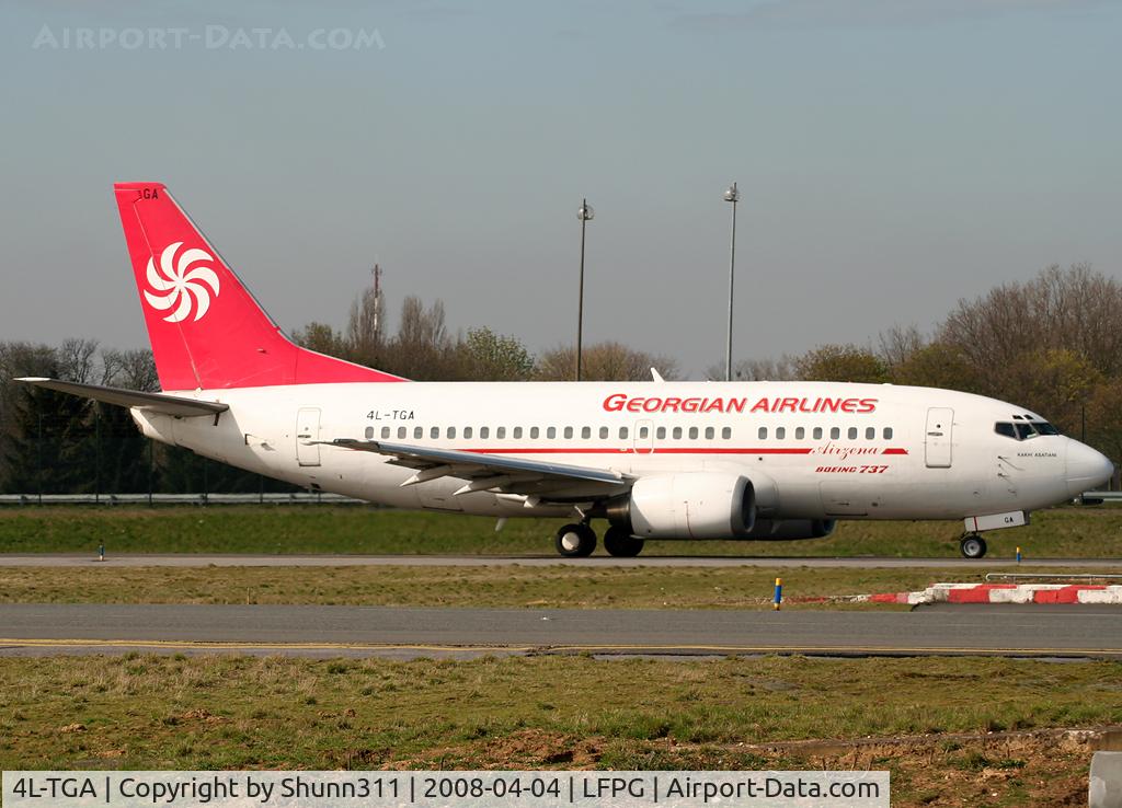 4L-TGA, 1991 Boeing 737-529 C/N 25218, Taxiing on parallels runways
