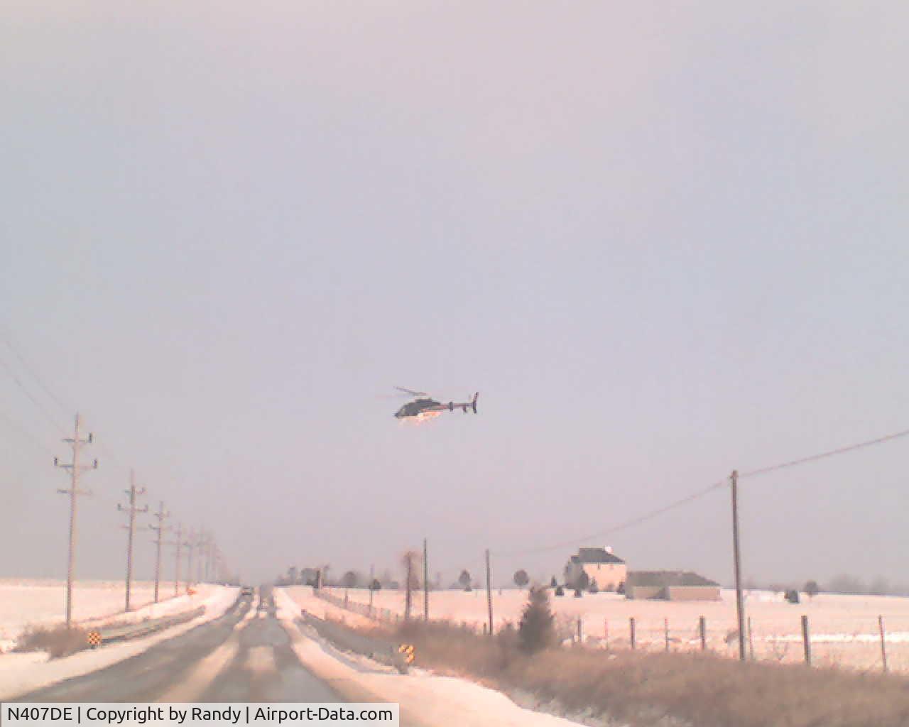 N407DE, Bell 407 C/N 53753, Checking power lines north of Jamestown, IN 1/18/09 (2)