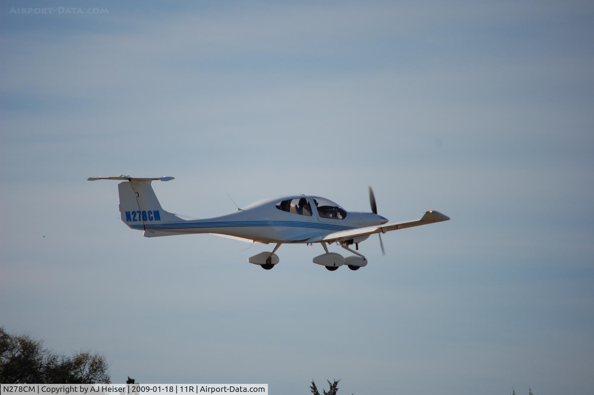 N278CM, 2004 Diamond DA-40 Diamond Star C/N 40.391, N278CM taking off runway 34 at 11R (Brenham Municipal, TX)