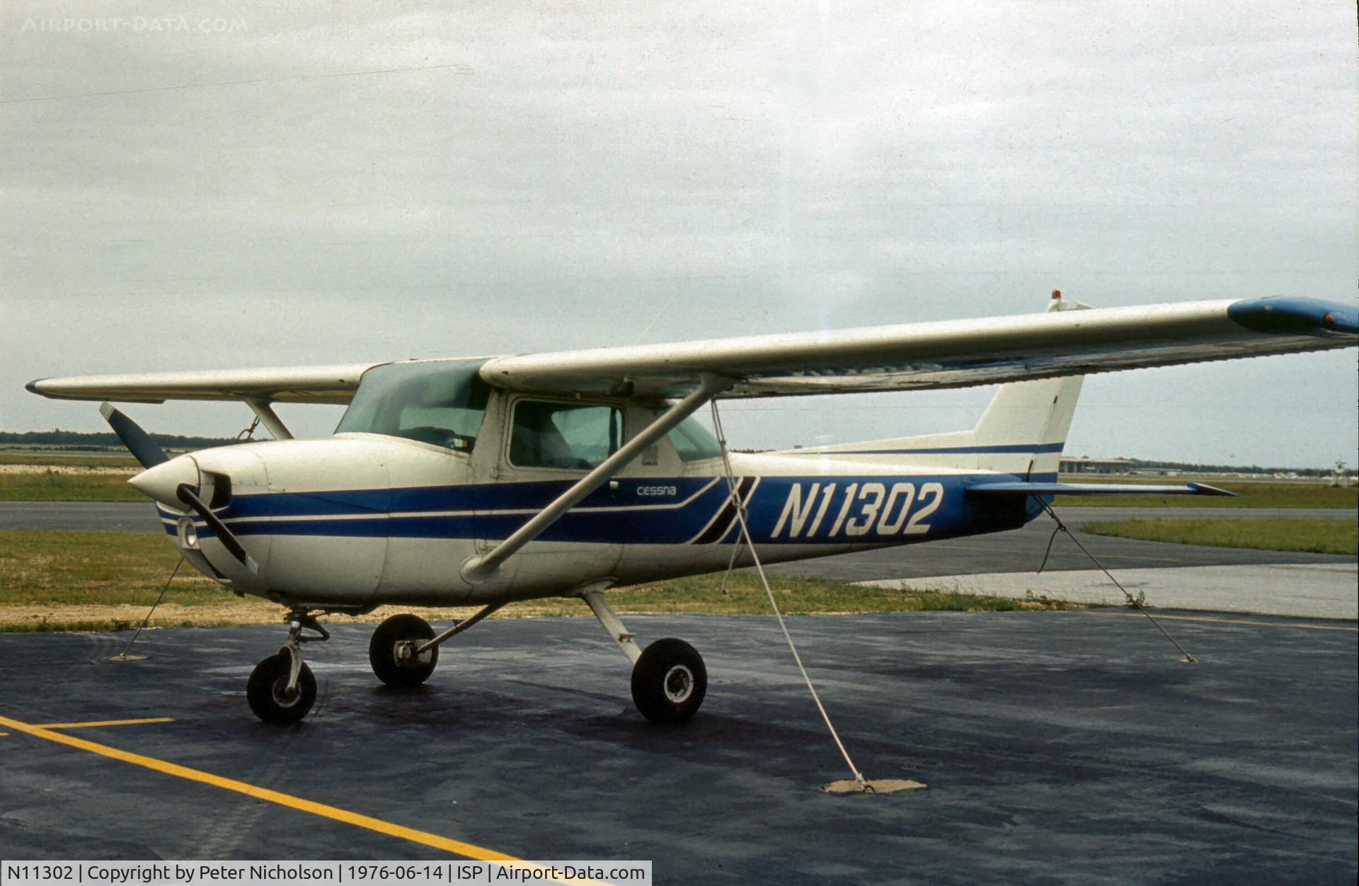 N11302, 1973 Cessna 150L C/N 15075311, This Cessna Commuter was parked at Islip-MacArthur in the summer of 1976.