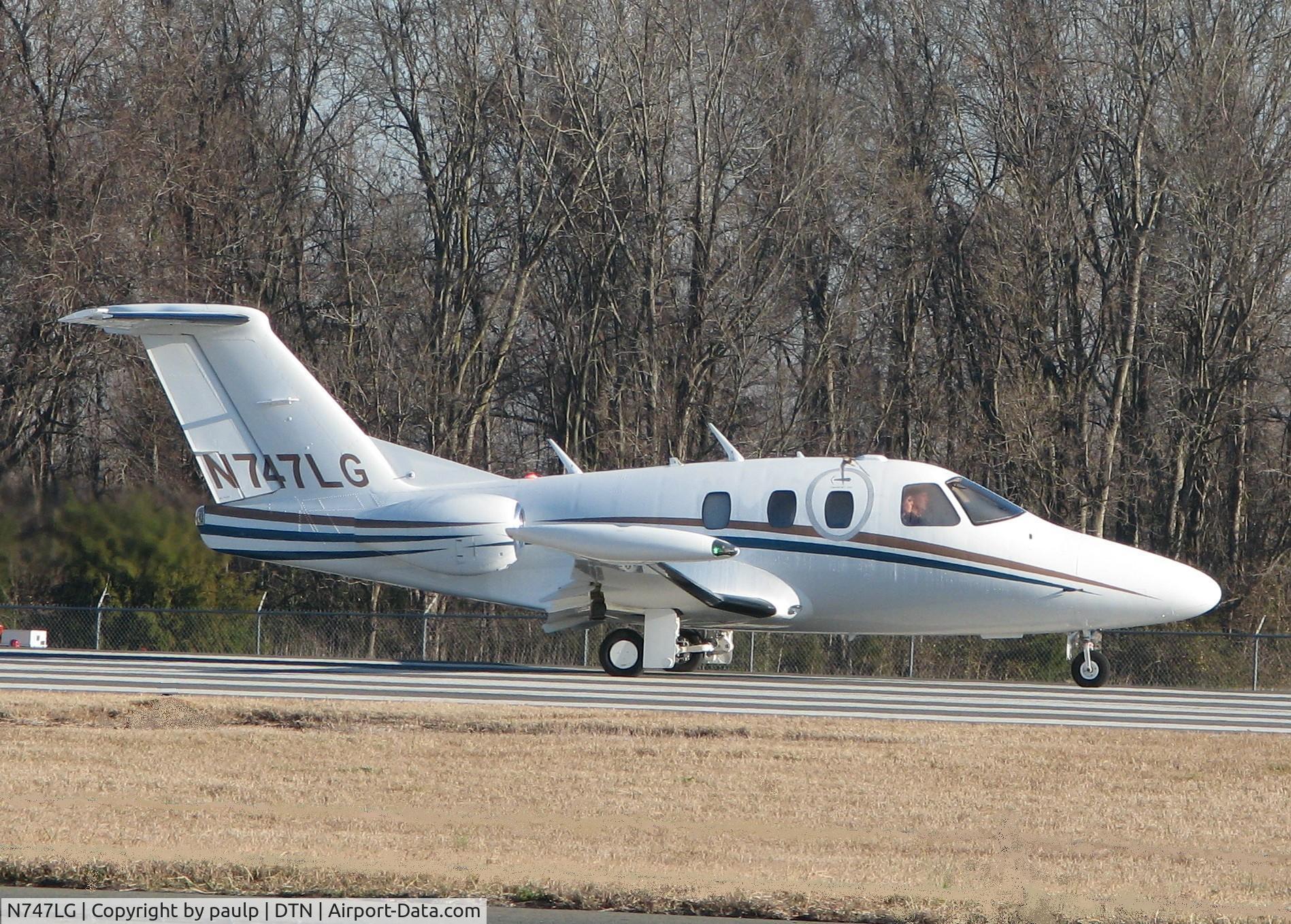 N747LG, 2008 Eclipse Aviation Corp EA500 C/N 000235, Taking off from Downtown Shreveport.