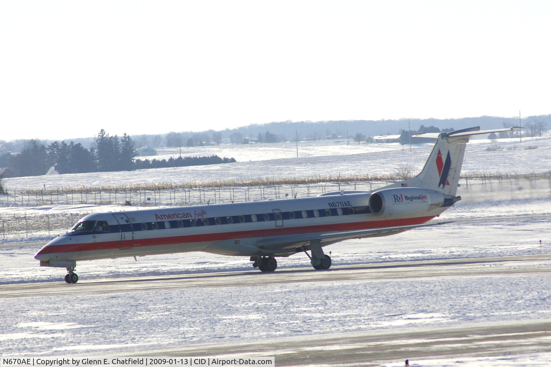 N670AE, 2004 Embraer ERJ-145LR (EMB-145LR) C/N 145790, Taxiing on Alpha to the terminal after landing Runway 27