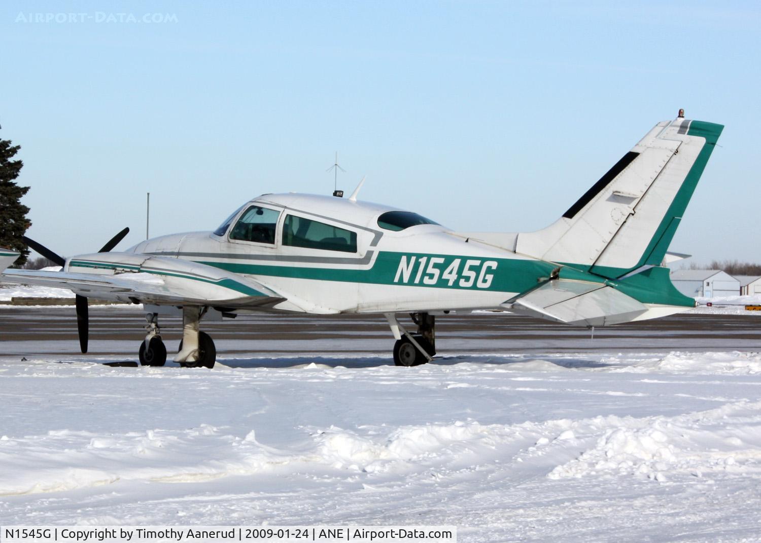 N1545G, 1977 Cessna 310R C/N 310R1220, 1977 Cessna 310R, c/n 310R1220, Parked at Anoka County, some time in the shop is going to be required to straighten the tail. 1977 Cessna 310R, c/n 310R1220