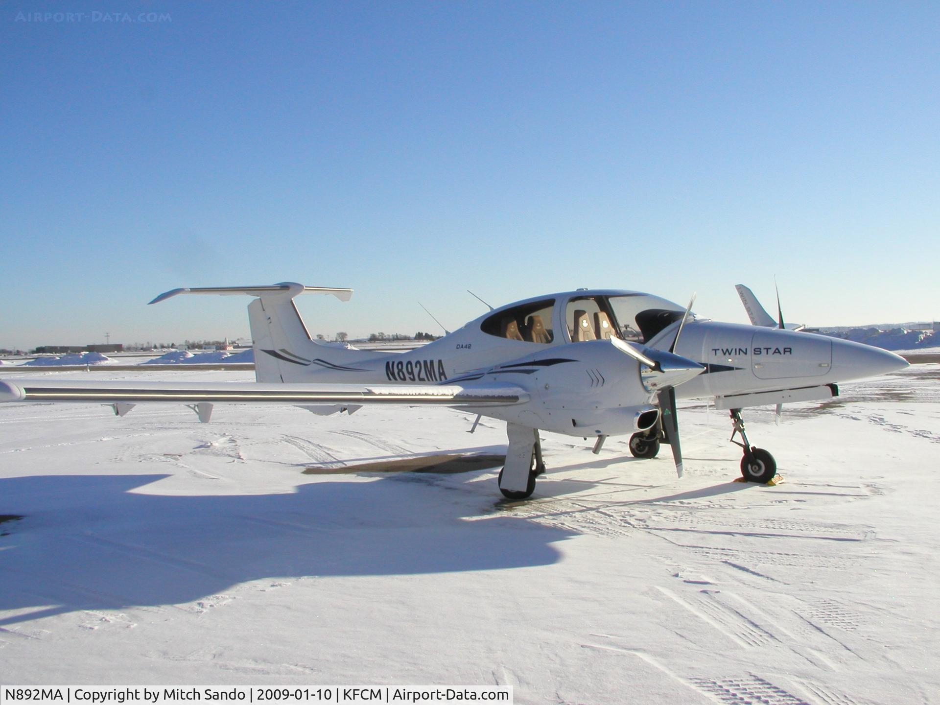 N892MA, 2008 Diamond DA-42 Twin Star C/N 42.AC122, Parked on the ramp at ASI.