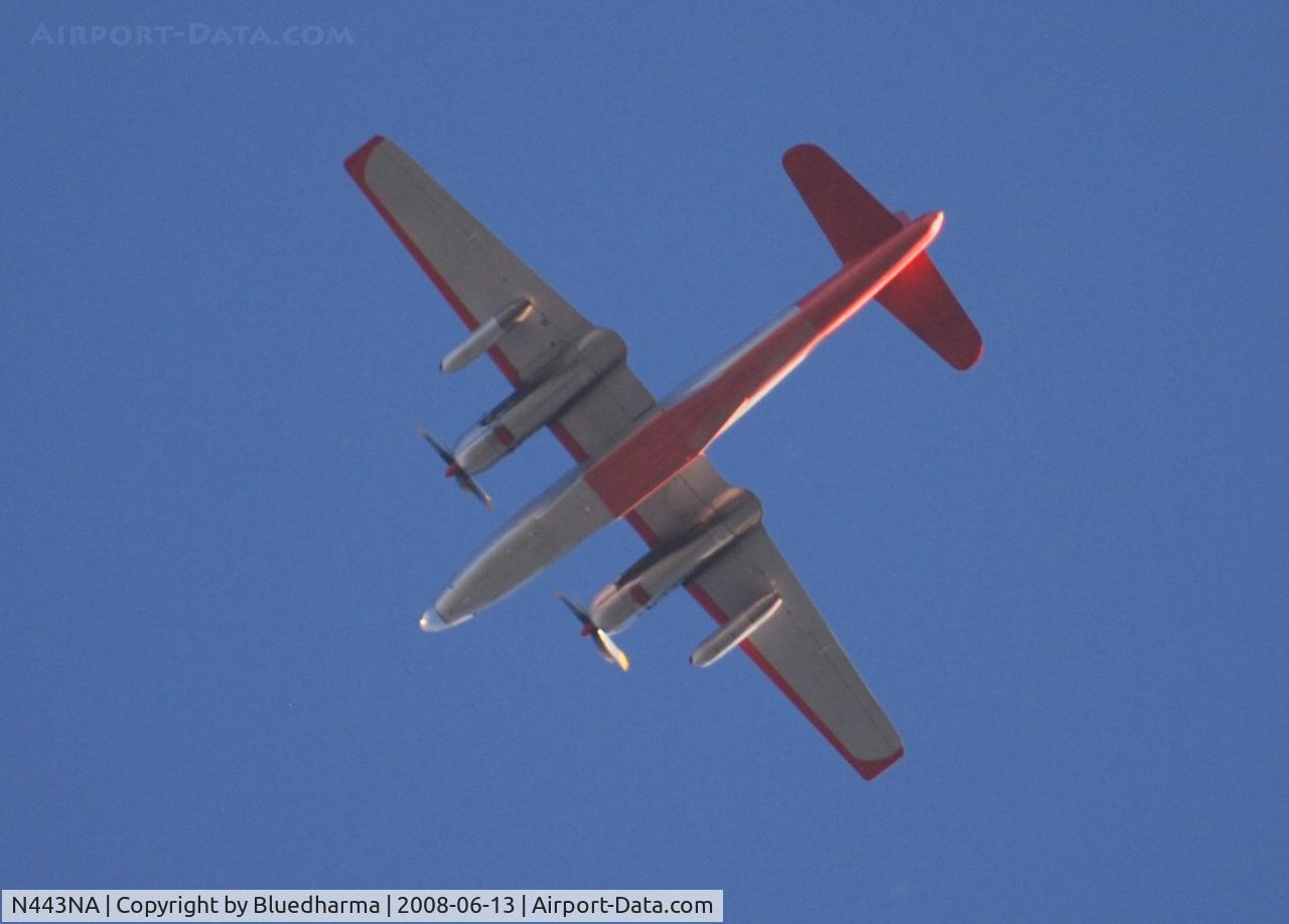 N443NA, 1958 Lockheed P2V-7 Neptune C/N 726-7168 (145906), Flying East over Columbine High School. My source tells me the 2 jet engines on the outboard pylon are used to get airborne when the temperature is high.