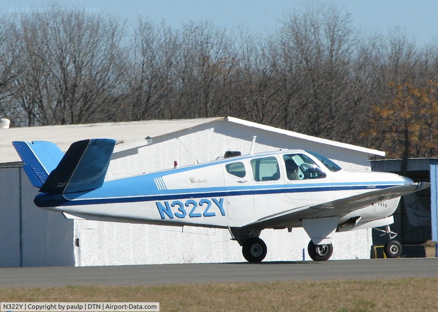 N322Y, 1960 Beech M35 Bonanza C/N D-6351, Taking off from Downtown Shreveport.