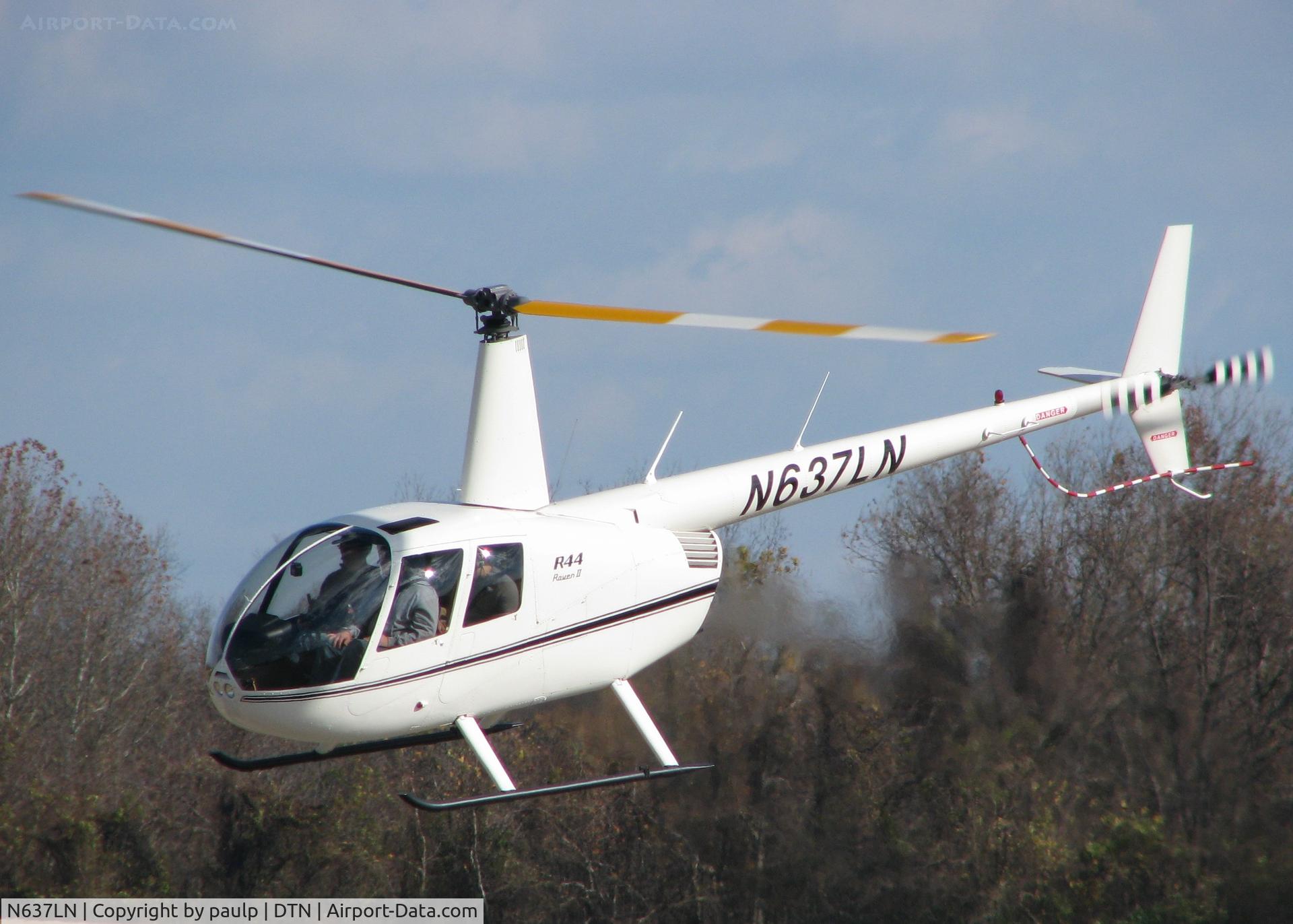 N637LN, 2007 Robinson R44 Raven II C/N 11637, Lifting off from Downtown Shreveport.