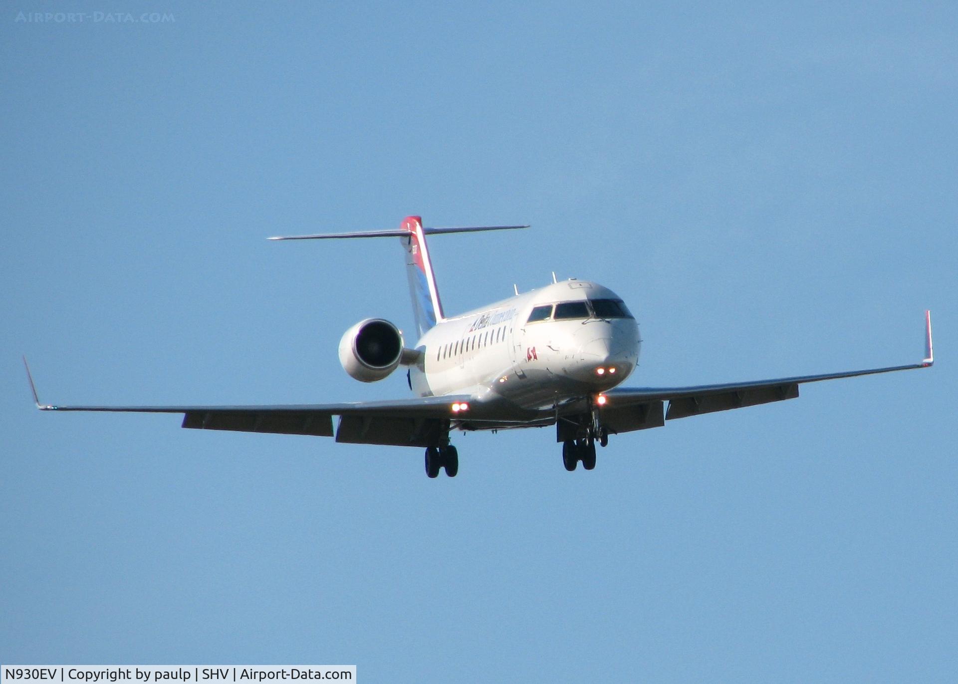 N930EV, 2005 Bombardier CRJ-200ER (CL-600-2B19) C/N 8014, Landing at Shreveport Regional.