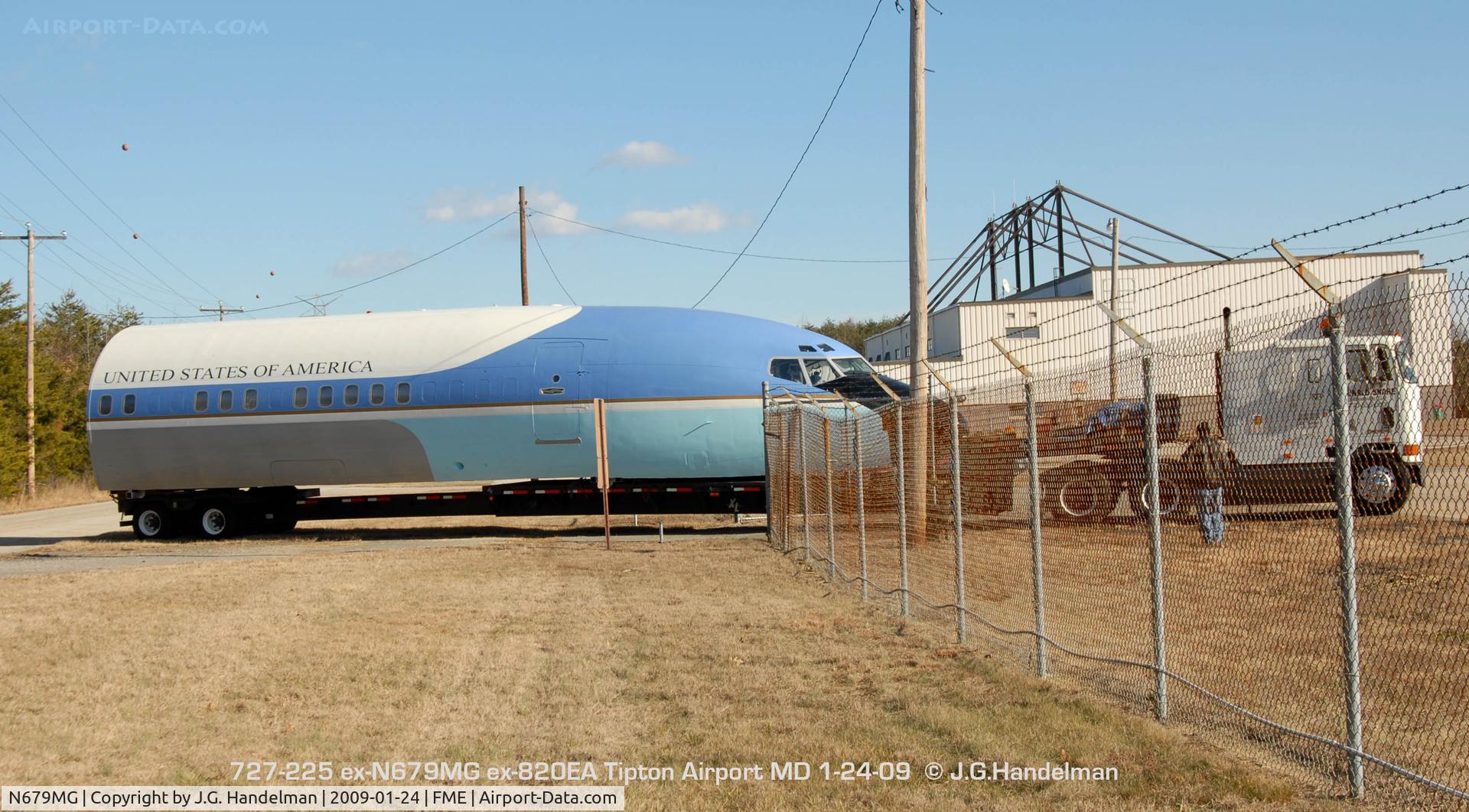 N679MG, 1982 Boeing 727-225 C/N 22557, trucking into hangar storage
