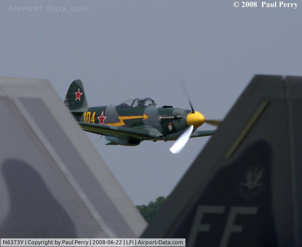 N6373Y, 1997 Yakovlev Yak-9U-M C/N 0470404, Framed up in the Raptor's tail