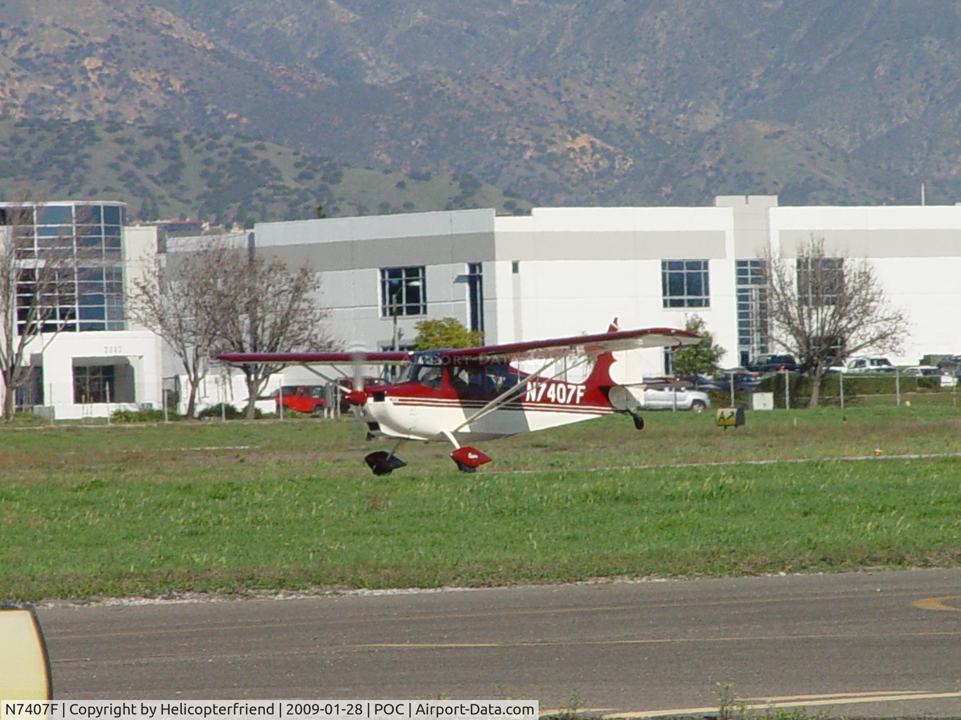 N7407F, 1999 American Champion 7GCAA Adventure Citabria C/N 416-98, Tail is up taking off on 26L