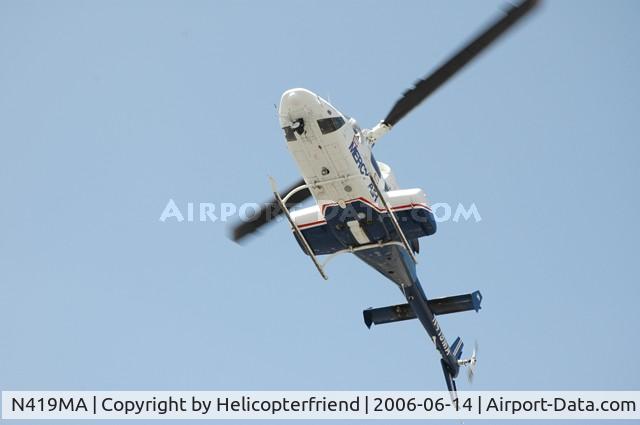 N419MA, 1984 Bell 222UT C/N 47518, Passing overhead for landing at Canine Demo at Chaffey College