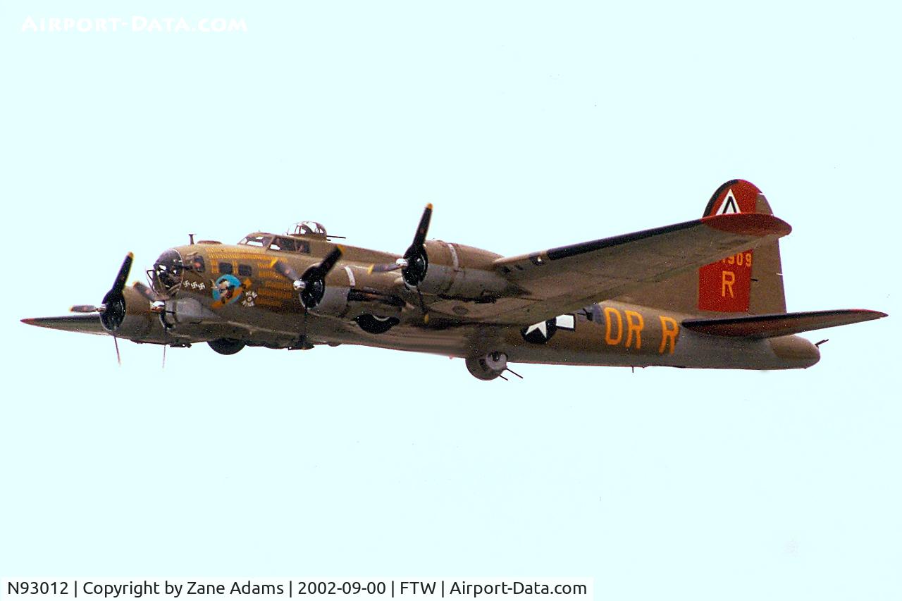 N93012, 1944 Boeing B-17G-30-BO Flying Fortress C/N 32264, Collings Foundation B-17, painted as the famed 909, departing Mecahm Field 
