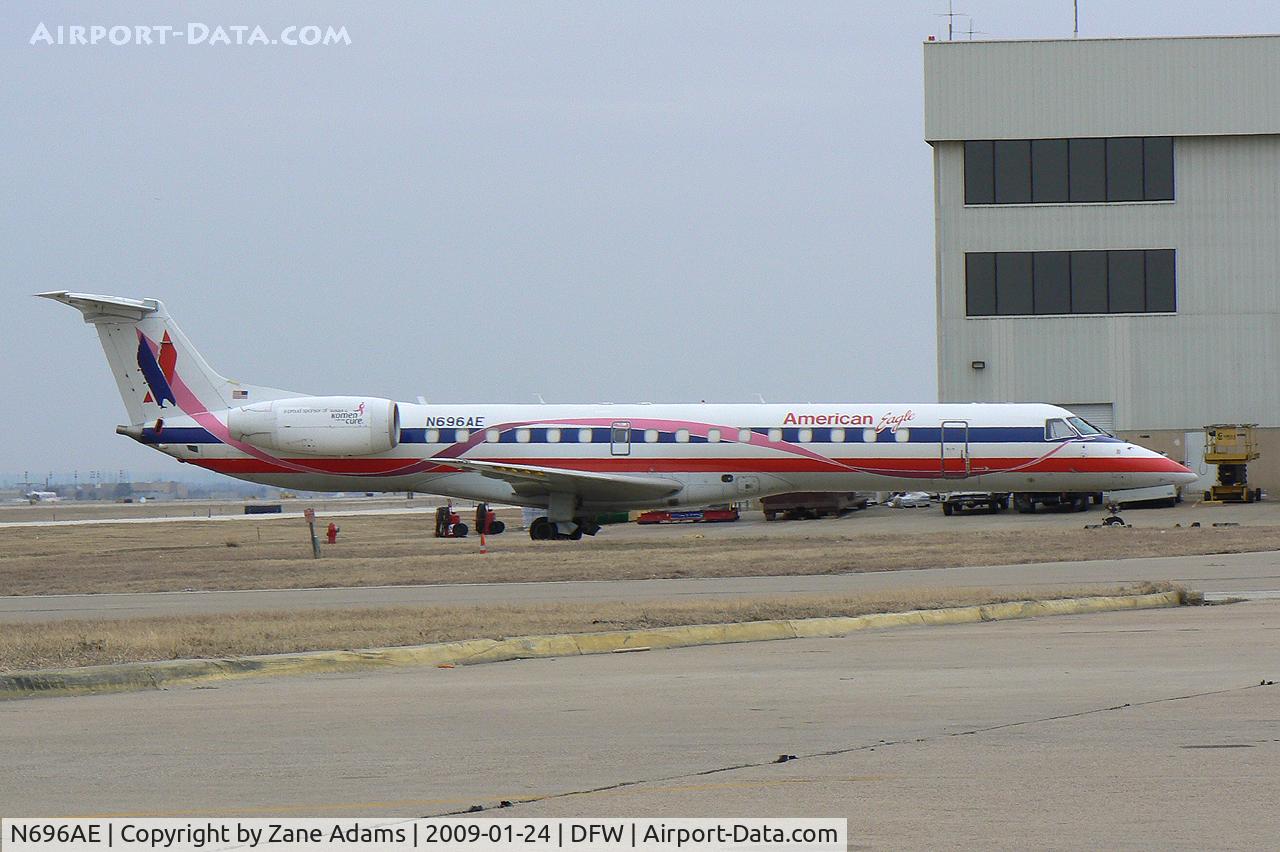 N696AE, 2004 Embraer ERJ-145LR (EMB-145LR) C/N 14500874, American Eagle at DFW - Special Paint - Susan G. Komen Race for the Cure