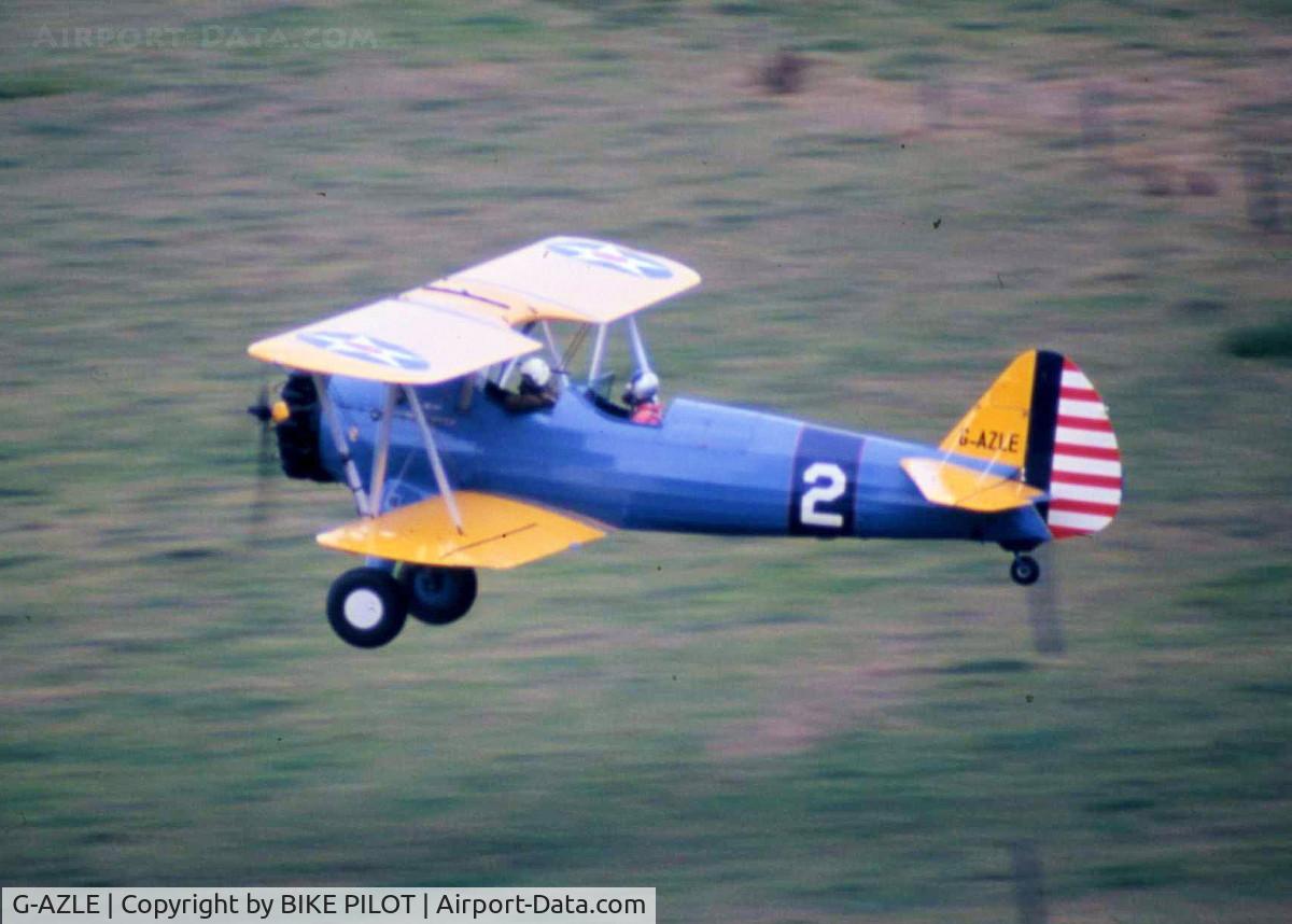 G-AZLE, 1940 Boeing E-75 C/N 75-8543, TAKING OF FROM IT'S FARM STRIP HOME NEAR ALDERSHOT HAMPSHIRE UK IN 1984. THIA A/C WAS SOLD BYE IT'S OWNER IN 1987 AND RE-AQUIRED IN 1993
