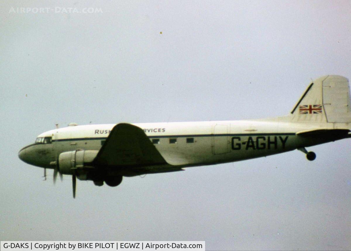 G-DAKS, 1943 Douglas C-47A-75-DL Skytrain C/N 19347, IN THE MARKINGS OF RUSKIN AIR SERVICES FOR THE TV SERIES AIRLINE, G-AGHY IS ACTUALY A TIGER MOTH