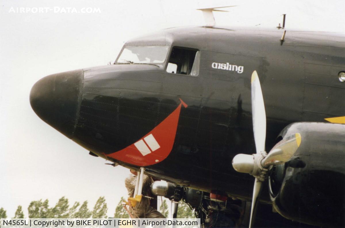 N4565L, 1939 Douglas DC-3-201A (C-47 Skytrain/Dakota) C/N 2108, SMILE FOR THE CAMERA.GOODWOOD AIRSHOW 1986
