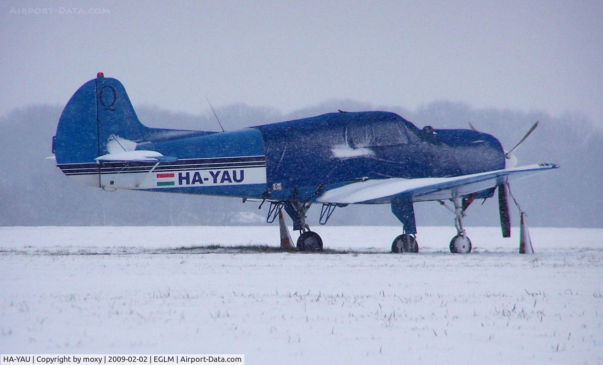 HA-YAU, 1998 Yakovlev Yak-18T C/N 15-35, YAK at a very white White Waltham