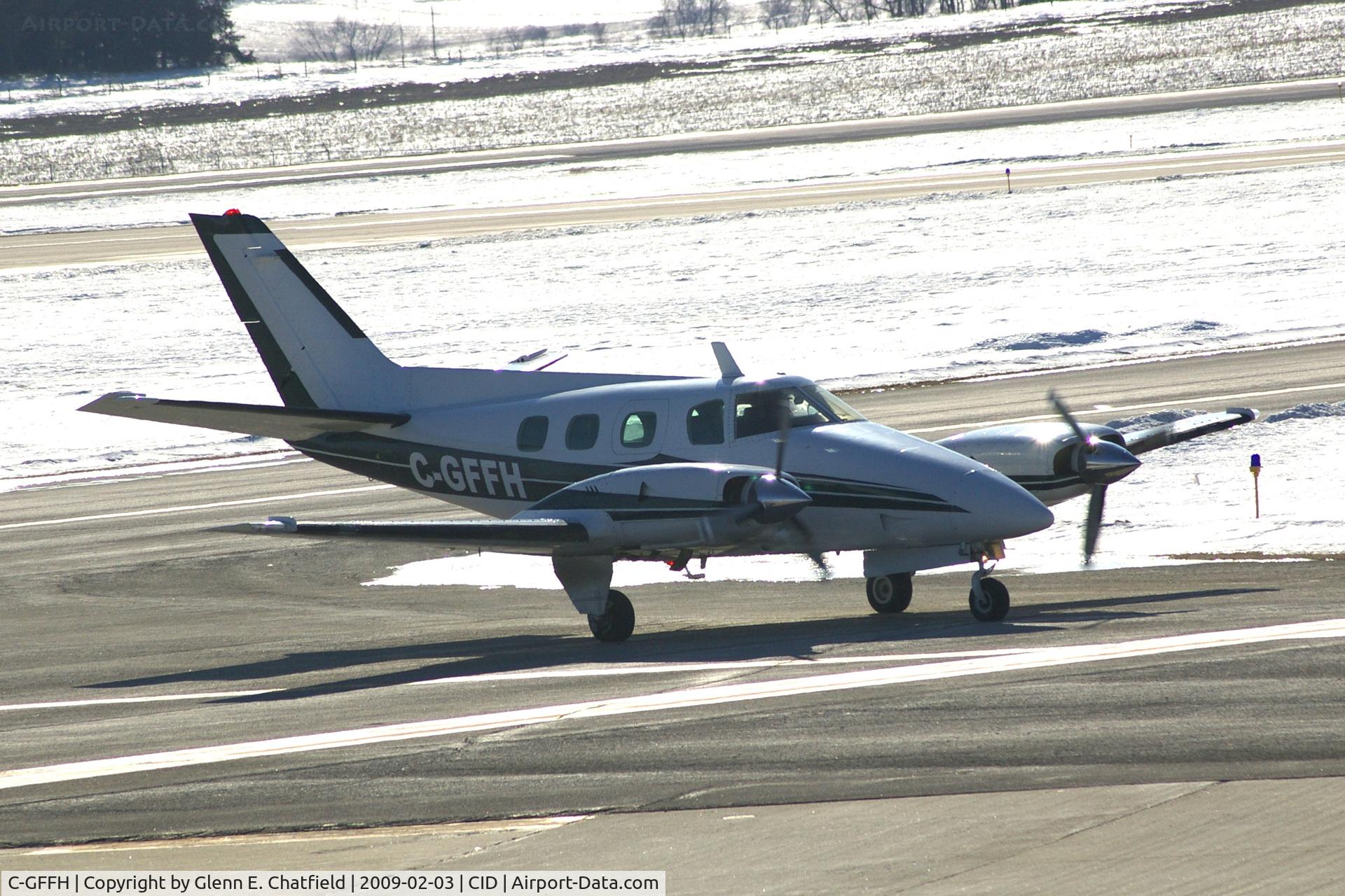 C-GFFH, 1975 Beech B-60 Duke C/N P-310, Taxiing by my window on the way to Landmark Aviation