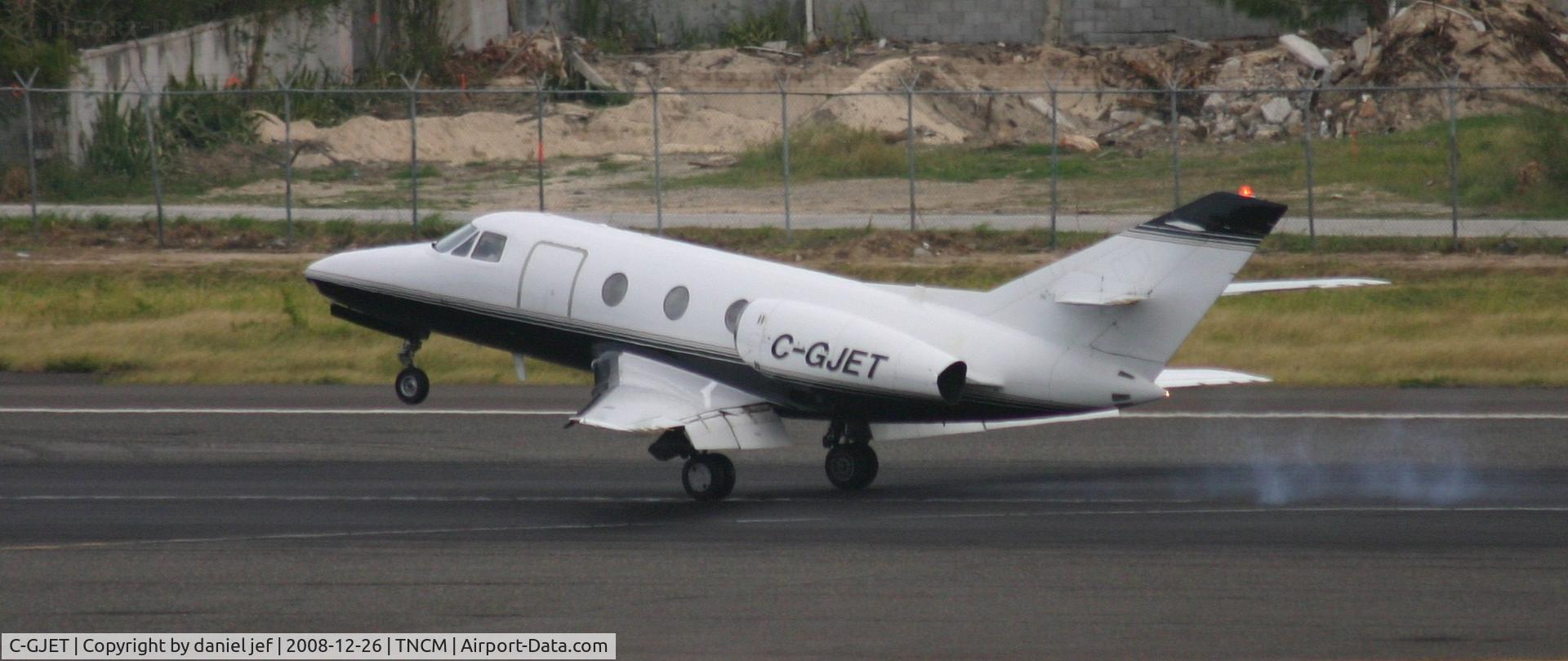 C-GJET, 1974 Dassault Falcon 10 C/N 25, touch down runway 10
