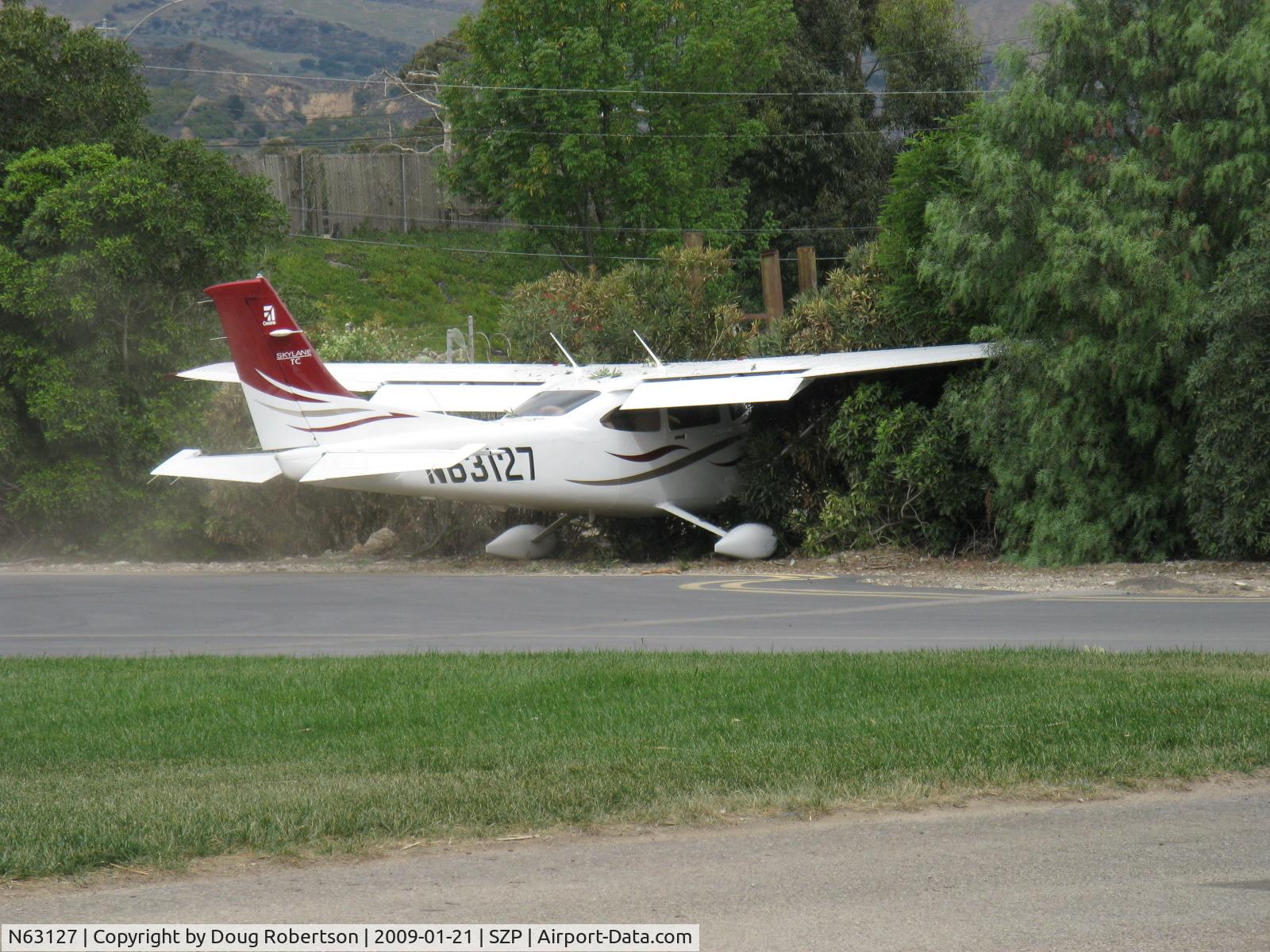 N63127, 2008 Cessna T182T Turbo Skylane C/N T18208883, 2008 Cessna T182T TURBO SKYLANE TC, Lycoming TIO-540-AK1A 235 Hp, landed long, fast and downwind on a bad day-Rwy 04 overrun into airport fence