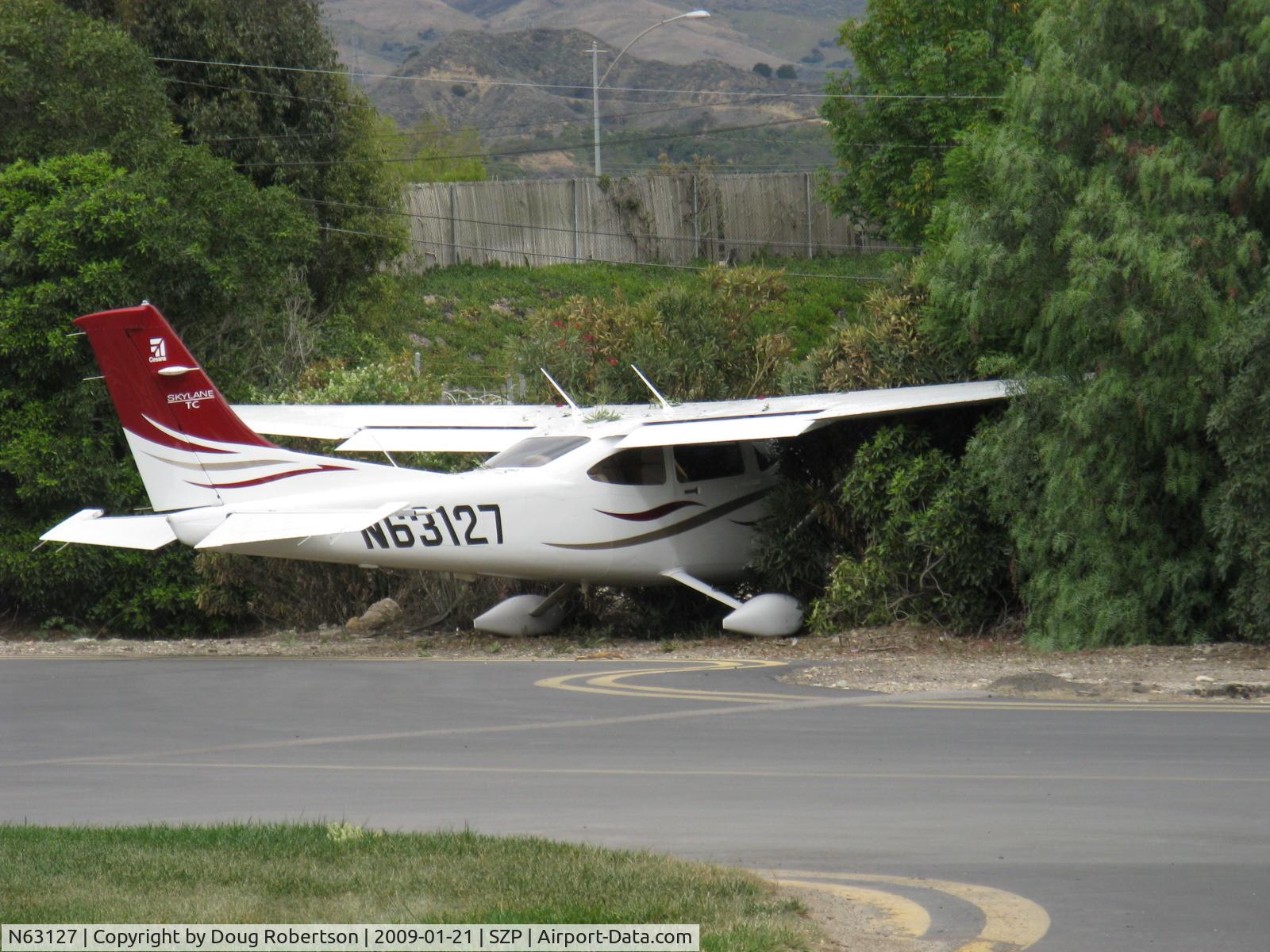 N63127, 2008 Cessna T182T Turbo Skylane C/N T18208883, 2008 Cessna T182T TURBO SKYLANE TC, Lycoming TIO-540-AK1A 235 Hp, landed long, fast and downwind on a bad day-Rwy 04 overrun into airport fence
