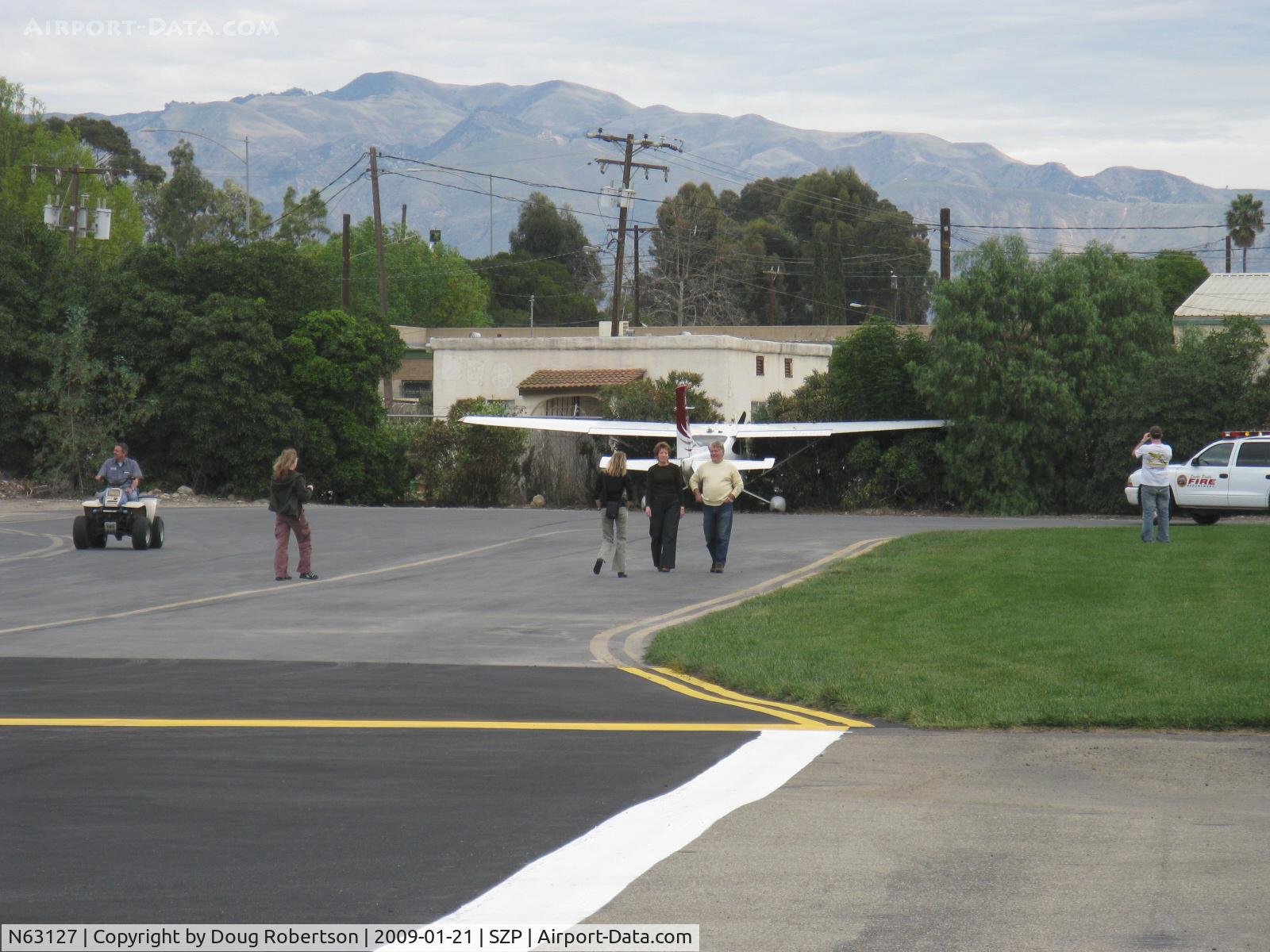 N63127, 2008 Cessna T182T Turbo Skylane C/N T18208883, 2008 Cessna T182T TURBO SKYLANE TC, Lycoming TIO-540-AK1A 235 Hp, landed long, fast and downwind on a bad day-Rwy 04 overrun into airport fence, pacing locked main gear tire skidmarks