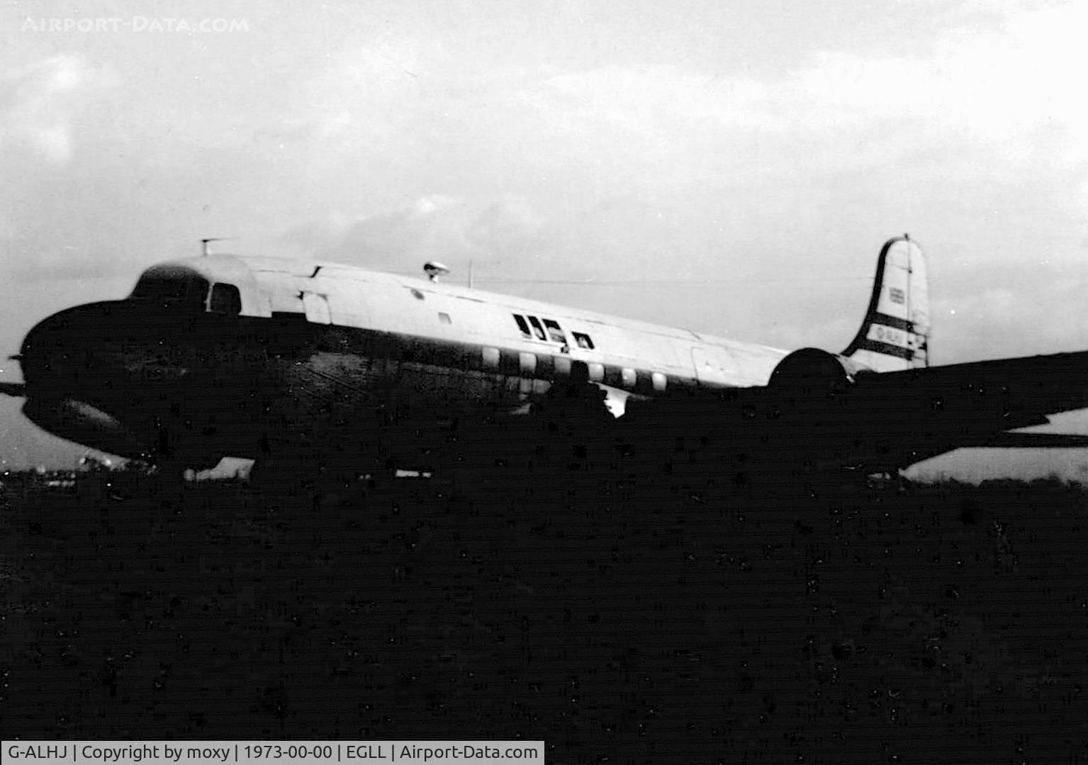 G-ALHJ, 1949 Canadair C-4 (DC-4M-2) Argonaut C/N 156, Old Argonaut looking pretty moody awaiting it's fate at dusk on the Heathrow fire dump.
