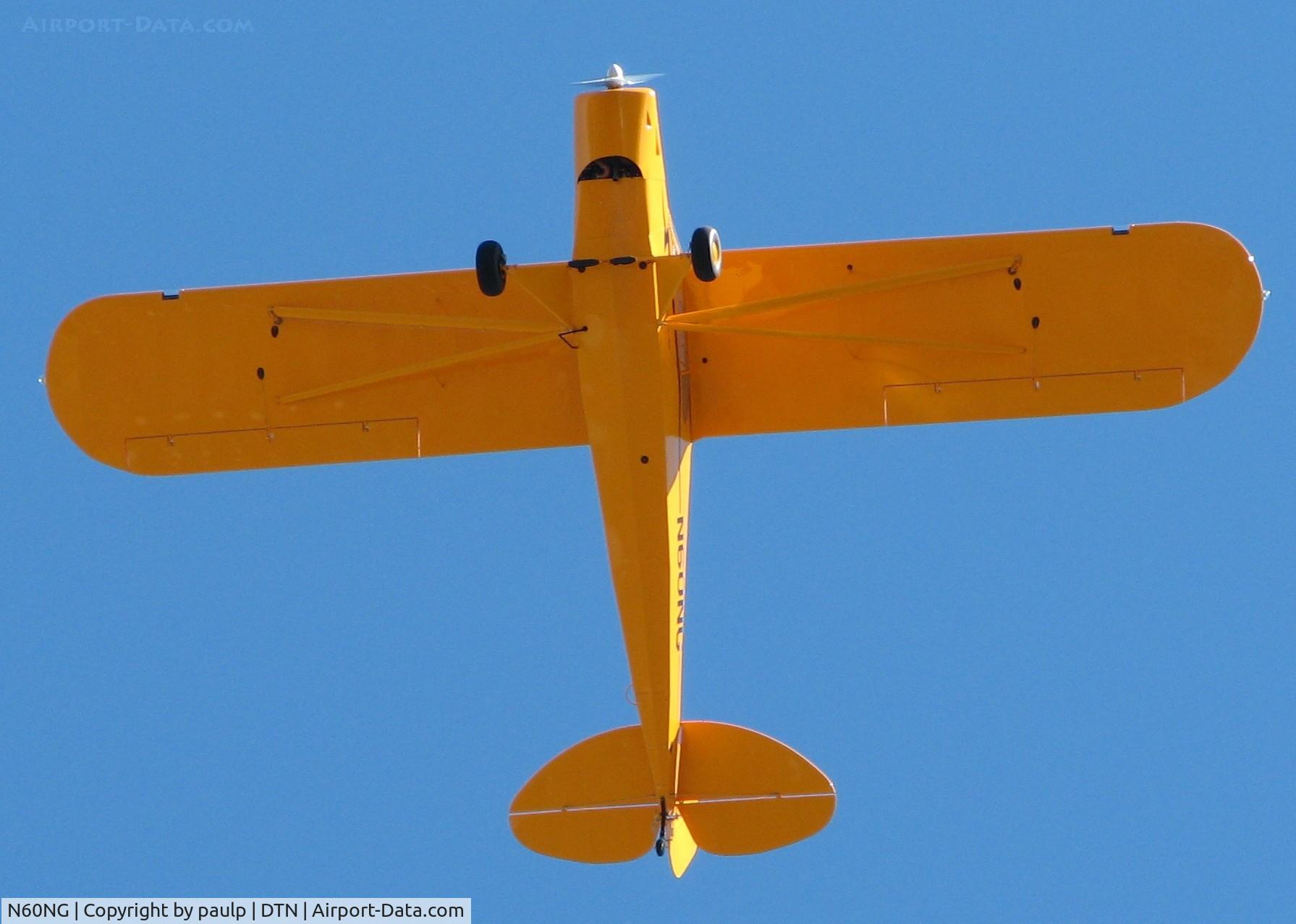 N60NG, American Legend AL11 C/N AL-1141, The bottom of a Cub over the Downtown Shreveport airport.
