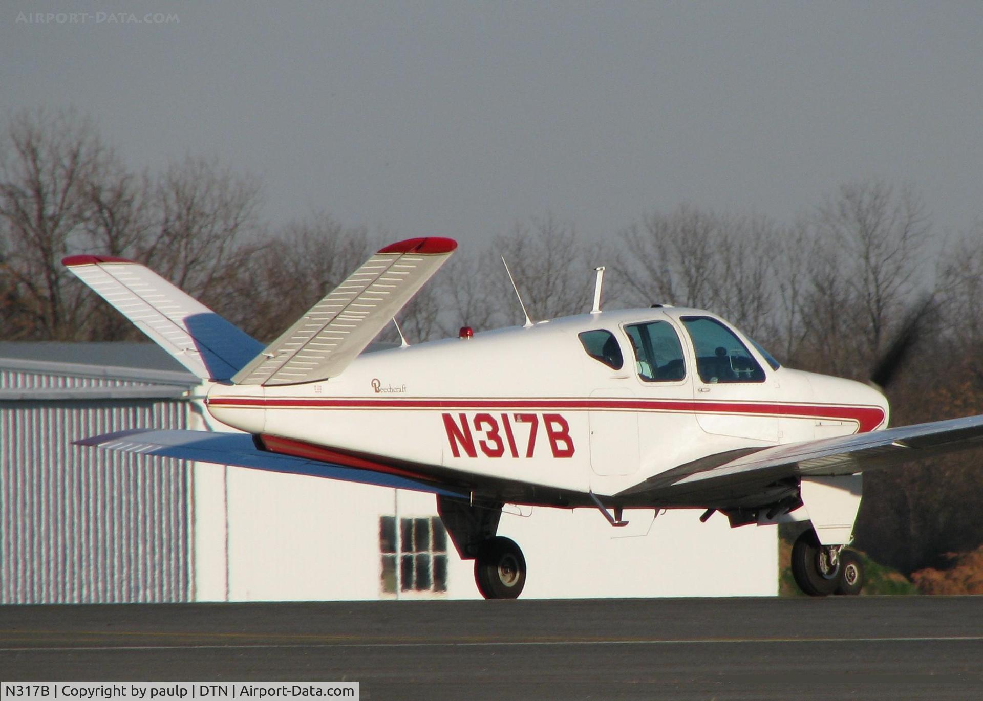 N317B, 1956 Beech G35 Bonanza C/N D-4816, About to lift off of 14 at the Downtown Shreveport airport.