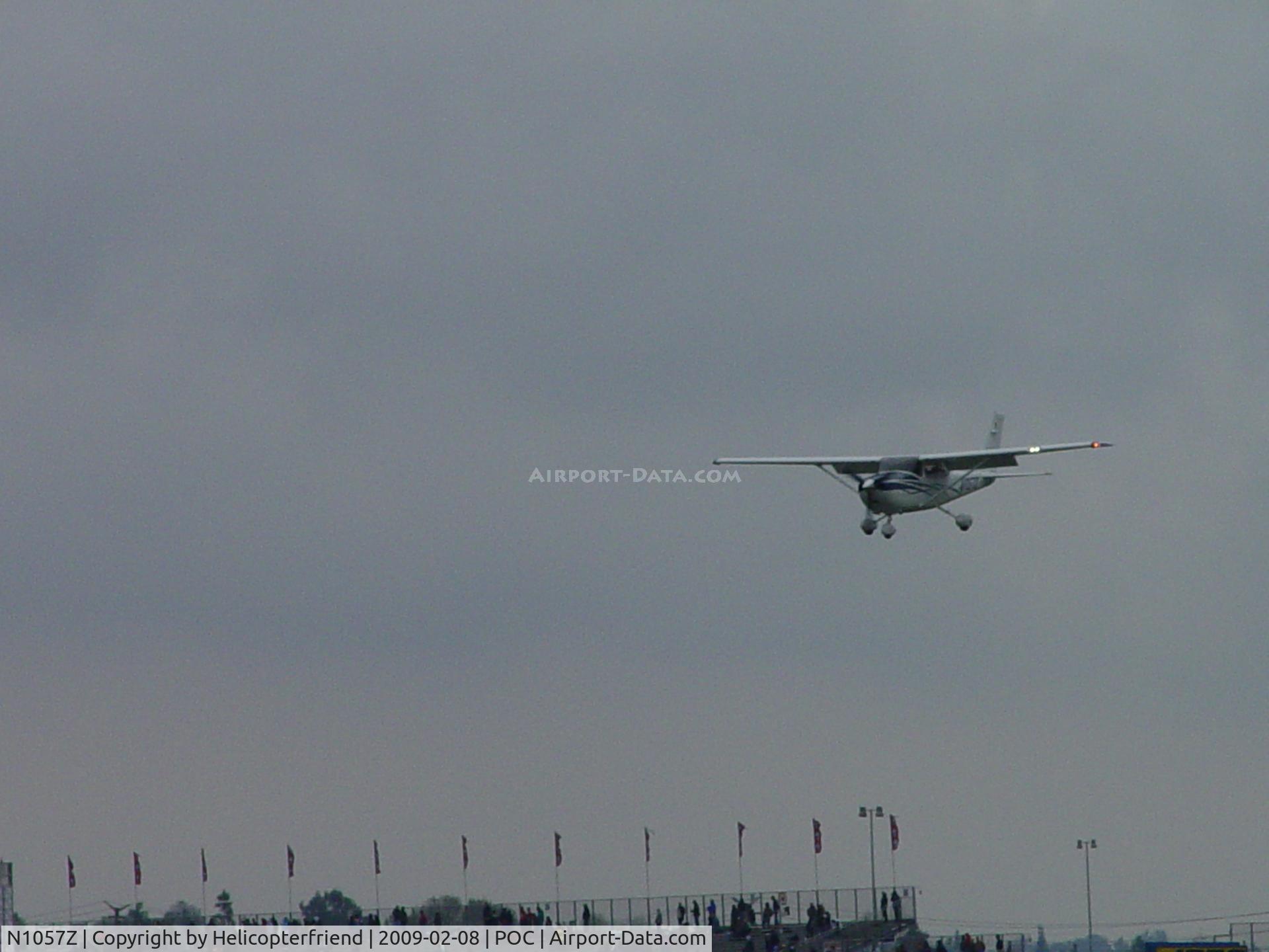 N1057Z, 2007 Cessna T182T Turbo Skylane C/N T18208795, On final passing under and in front of Goodyear Blimp
