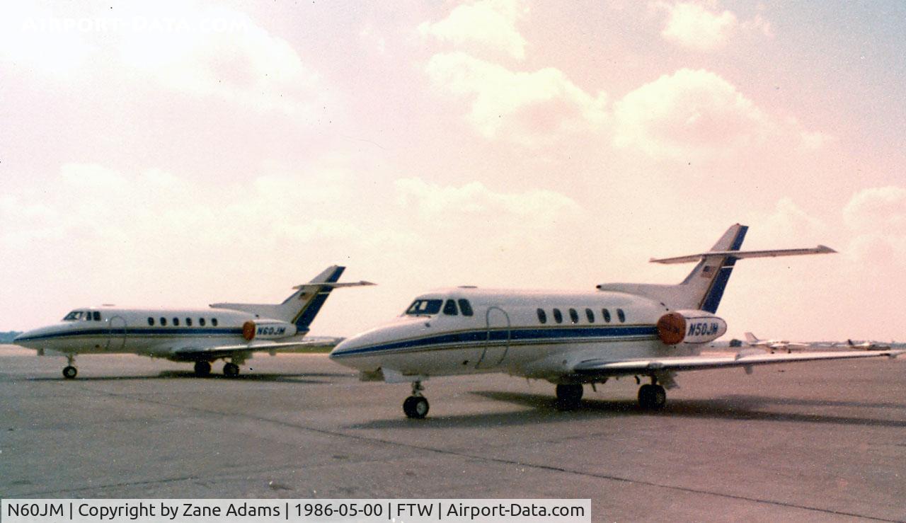 N60JM, 1978 Hawker Siddeley DH.125-1A C/N 257033, N50JM (front) and N60JM (rear) at Meacham Field