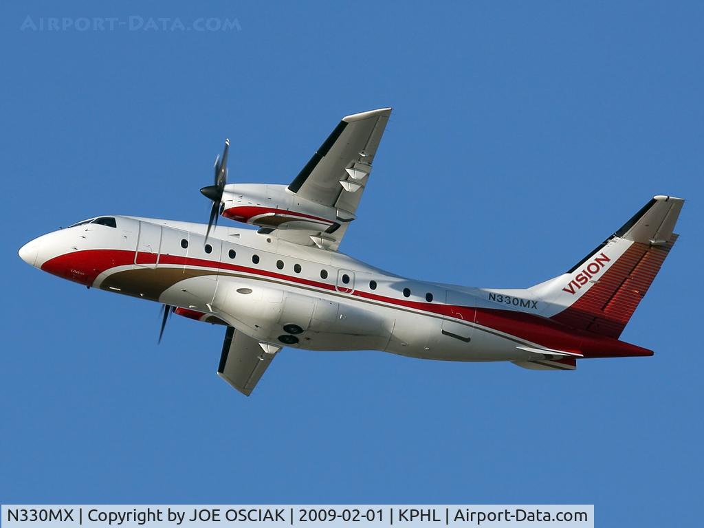 N330MX, 1996 Dornier 328-100 C/N 3067, Leaving PHL.