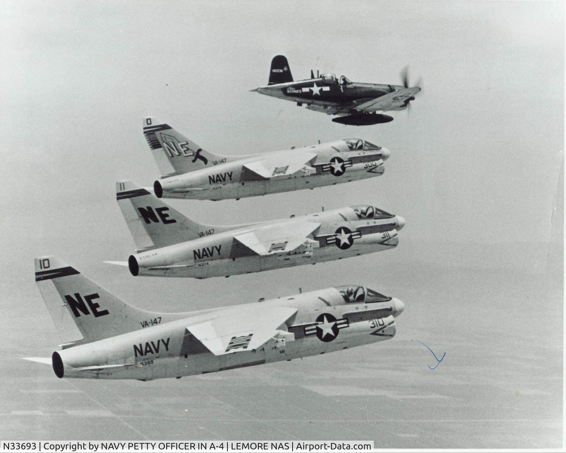N33693, Vought F4U-7 Corsair C/N Not found (Bu133693), LYNN GARRISON IN HIS F4U-7 LEADS VA-147 AFTER GRADUATION CEREMONY. FIRST UNIT TO DEPLOY A7 IN VIET NAME