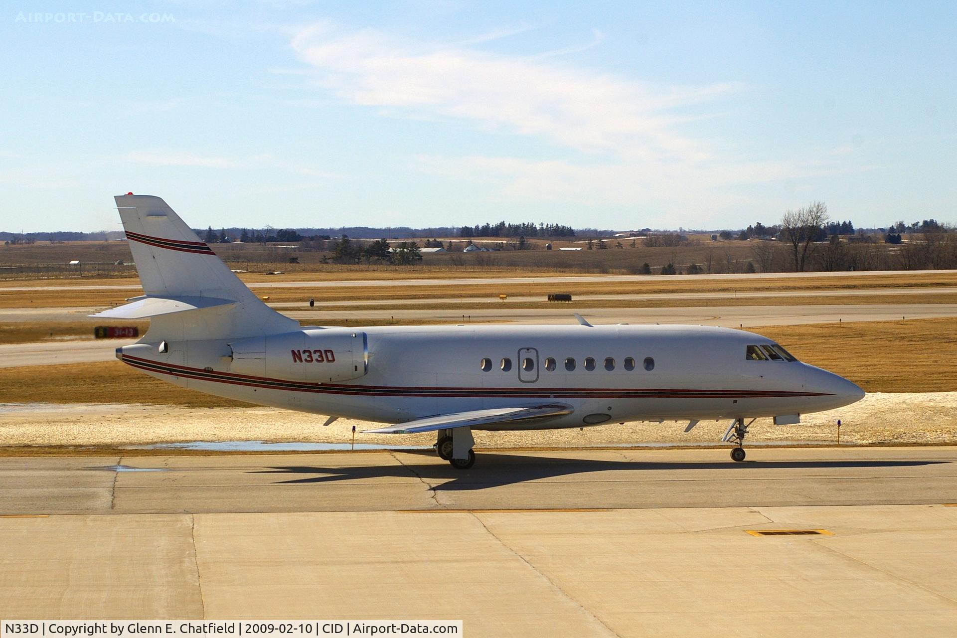 N33D, 2005 Dassault Falcon 2000 C/N 224, Taxiing by the tower on the way to Landmark FBO